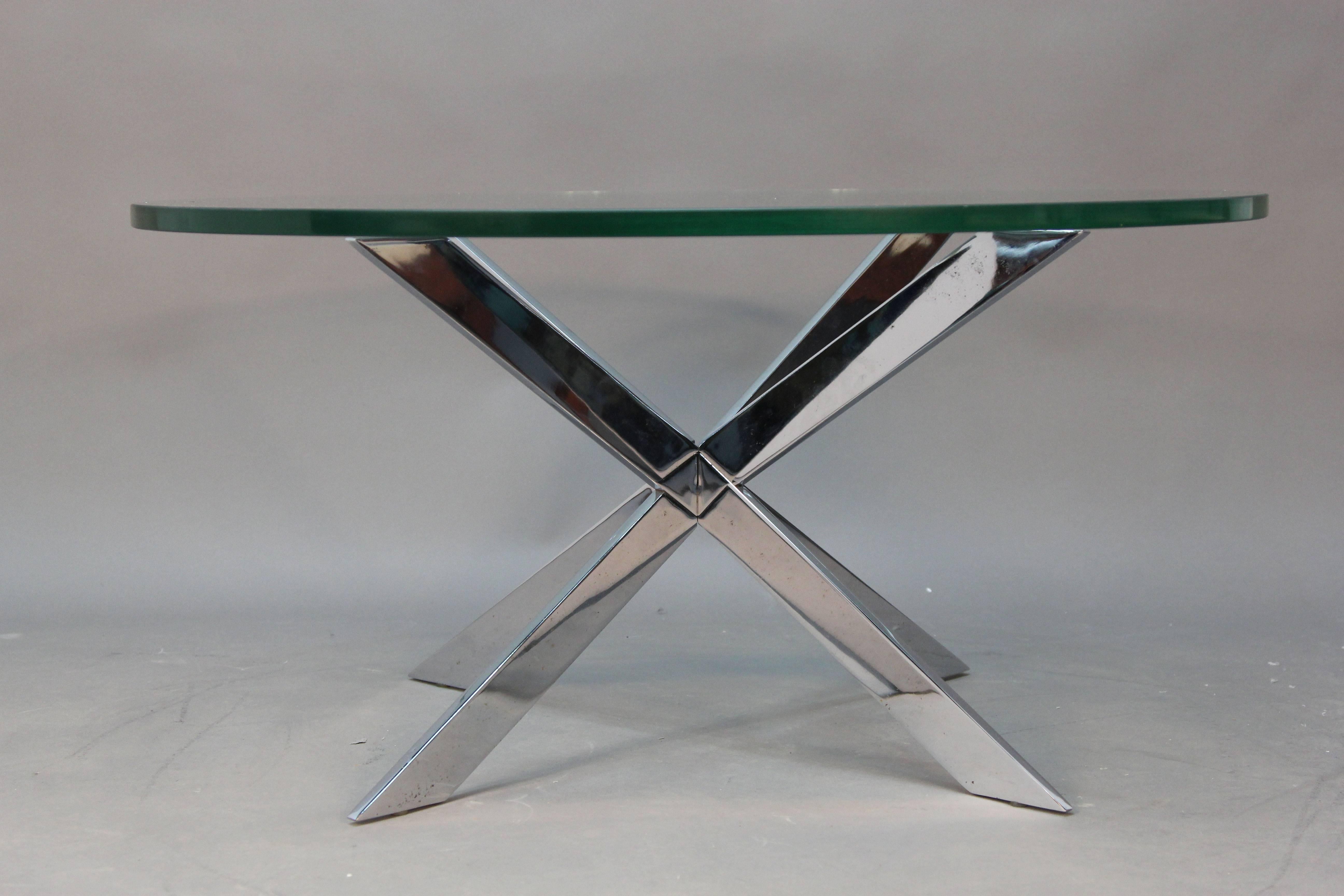 Available with clear or original smoked glass top, this chrome star base coffee table was designed by Leon Rosen for Pace Collection. Incredible style and sleek lines.

The Pace Collection was a high-end contemporary furniture company in business