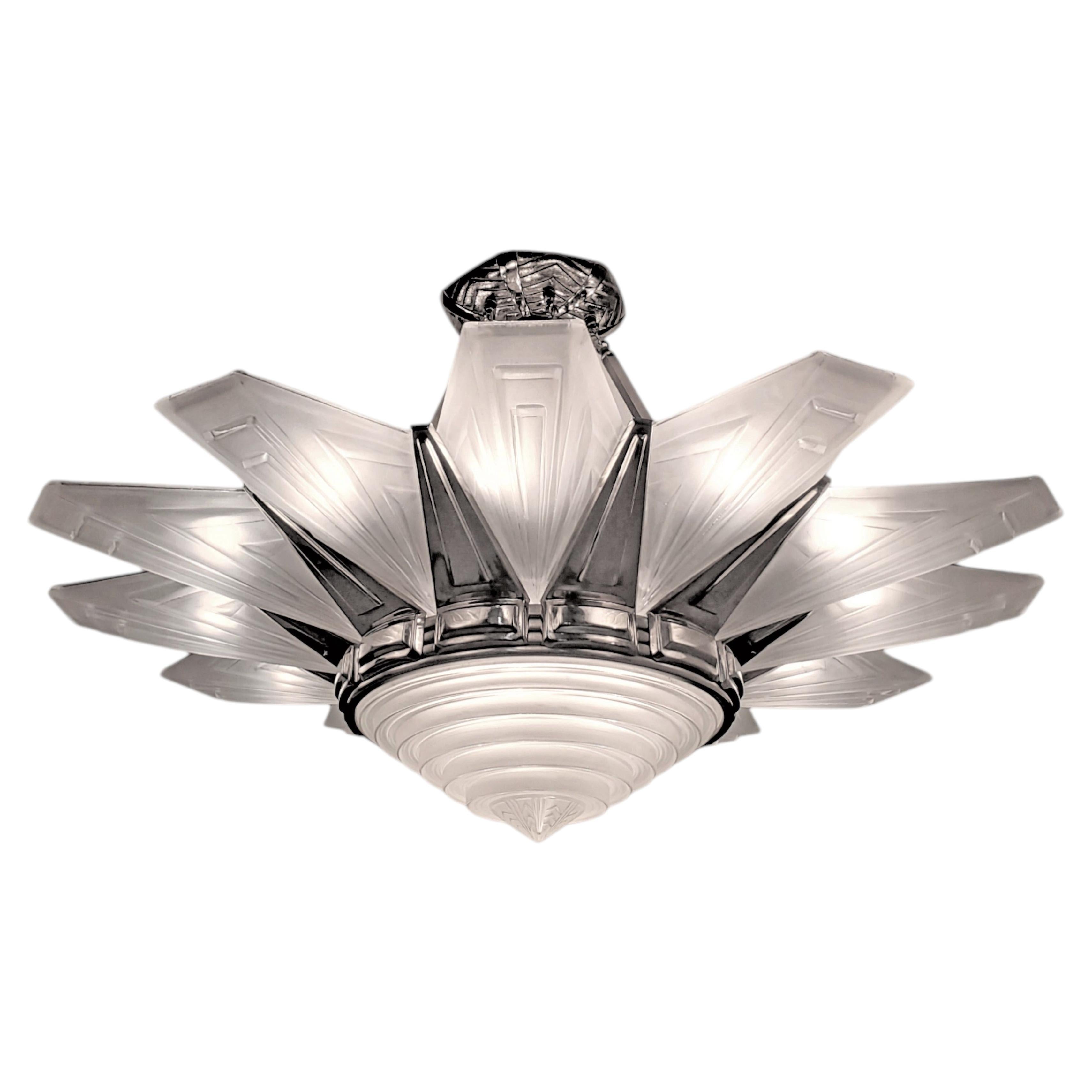 Palatial Art Deco starburst 12 panel frosted art glass and nickel chandelier For Sale
