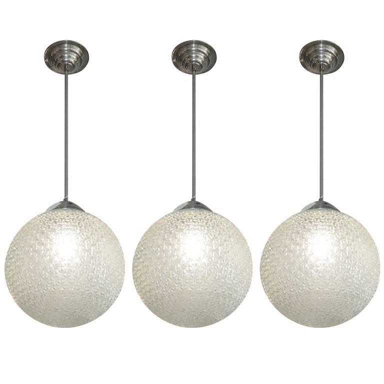 French Modernist Glass Globe Shaped Chandeliers one two or three