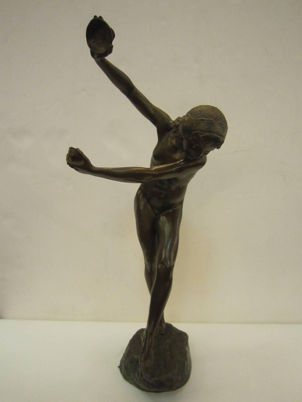 A Laurence Dupuy large bronze sculpture representing a young woman, naked , wearing a stylized headdress and dancing with cymbals.
signed on the base: L. Dupuy and Susse Fres Edts, along with circular foundry stamp.
This is a tall Art Deco statue
