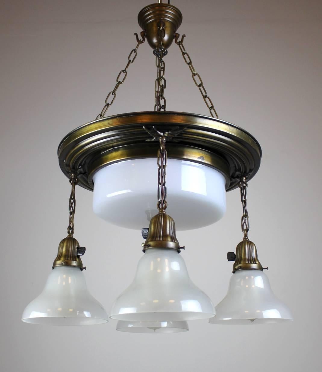 Impressive five light (four light + centre bowl) shower fixture.

Classical Revival Style, with Reed & Ribbon design + Sheffield Holders,

circa 1915, finished in a dark brass with highlights.

Meas: 31