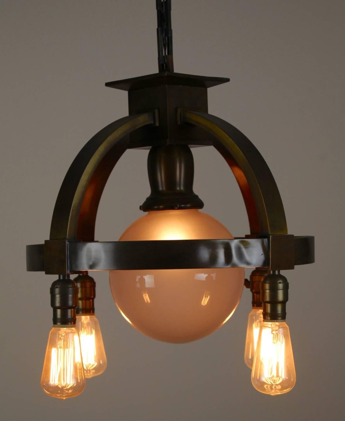 Commercial Ring Fixture with Four Bare Bulbs and Centre Globe In Good Condition For Sale In Vancouver, BC