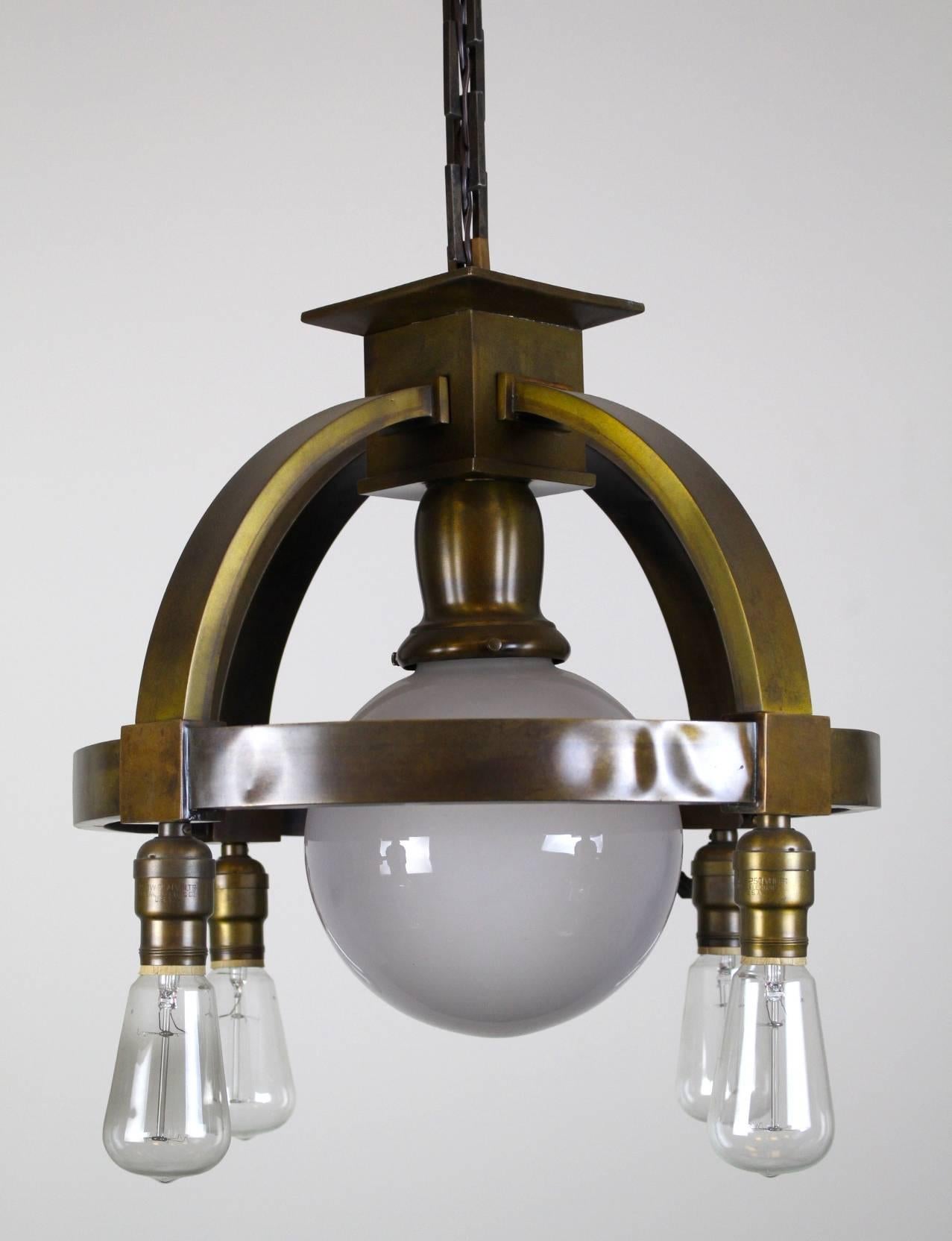 Early 20th Century Commercial Ring Fixture with Four Bare Bulbs and Centre Globe For Sale