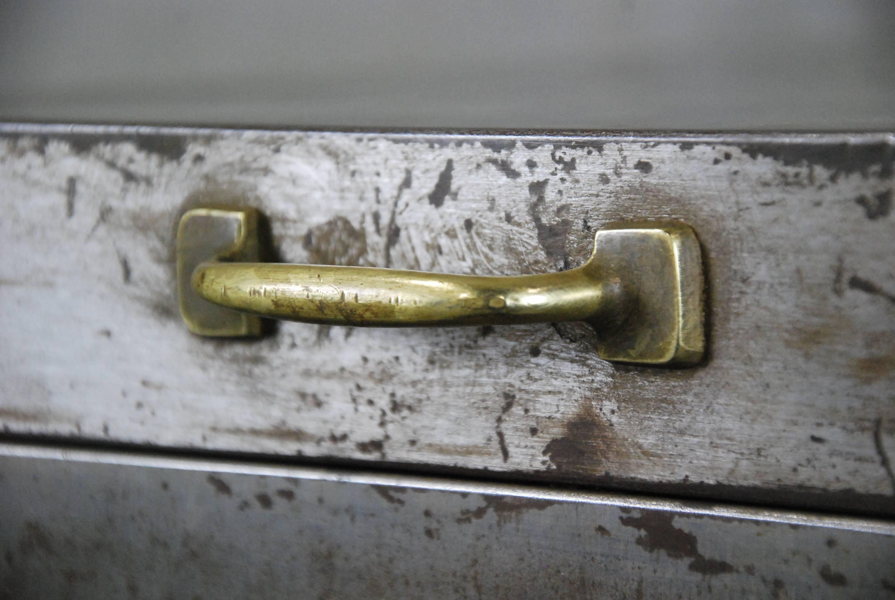 Fully working brushed down to steel filing cabinet on wheels.

Automatic File & Index Co., circa 1920-1929 The Automatic File & Index Co., sole manufacturers of the automatic filing cabinet and a complete line of other filing devices. Green Bay,