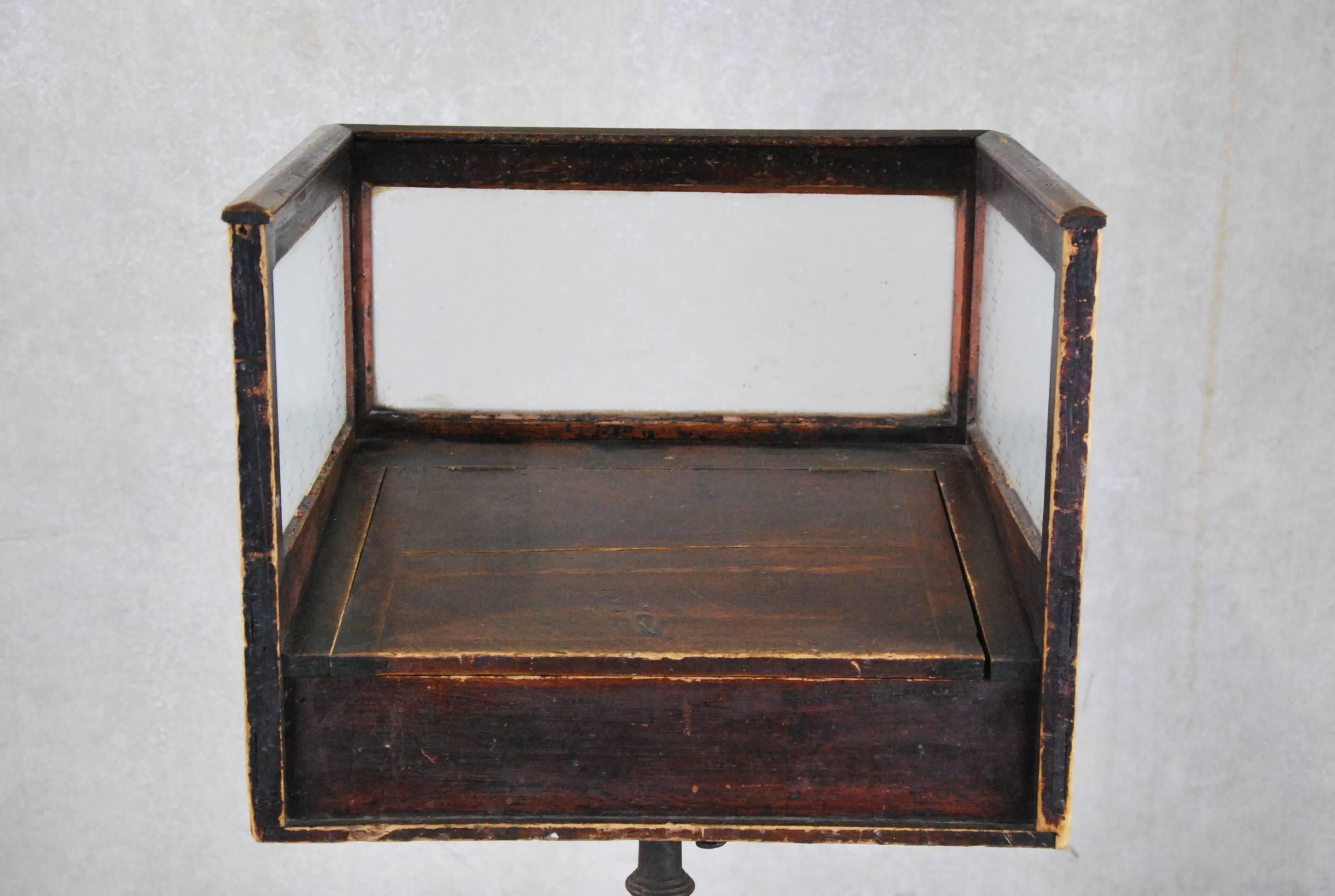 Very nice wooden cubicle with etched glass sides and lift top working drawer. 
This wooden gem rest upon a nice 1900 cast iron base in original patina.

Make an ideal small hostess stand.
 