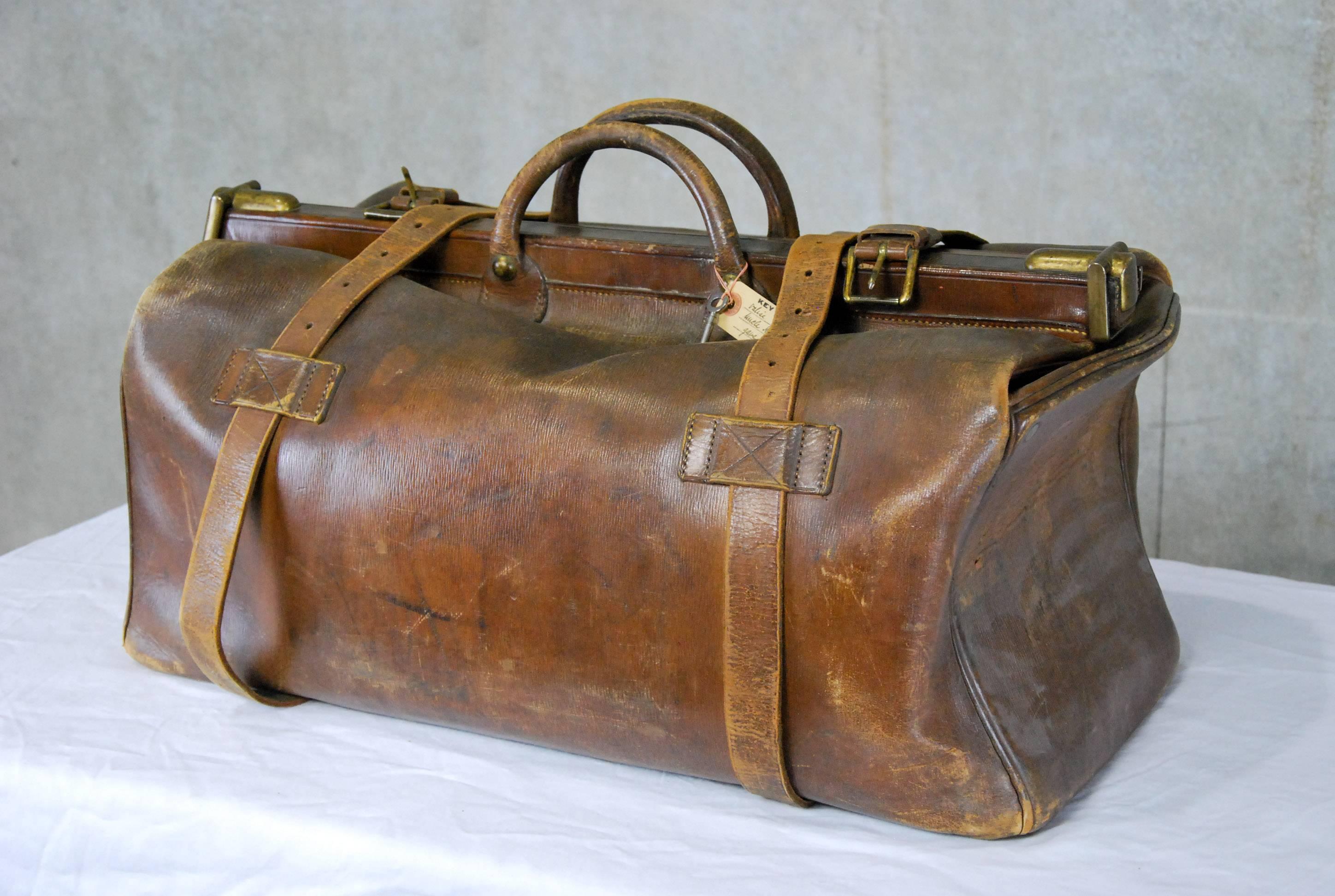 Leather bag with working key, brass hilites and great condition. Purchased from a prominent family in Montreal.

The Army and Navy Co-Operative Society Ltd was formed in 1871 by a group of British army and navy officers. It was their intention to