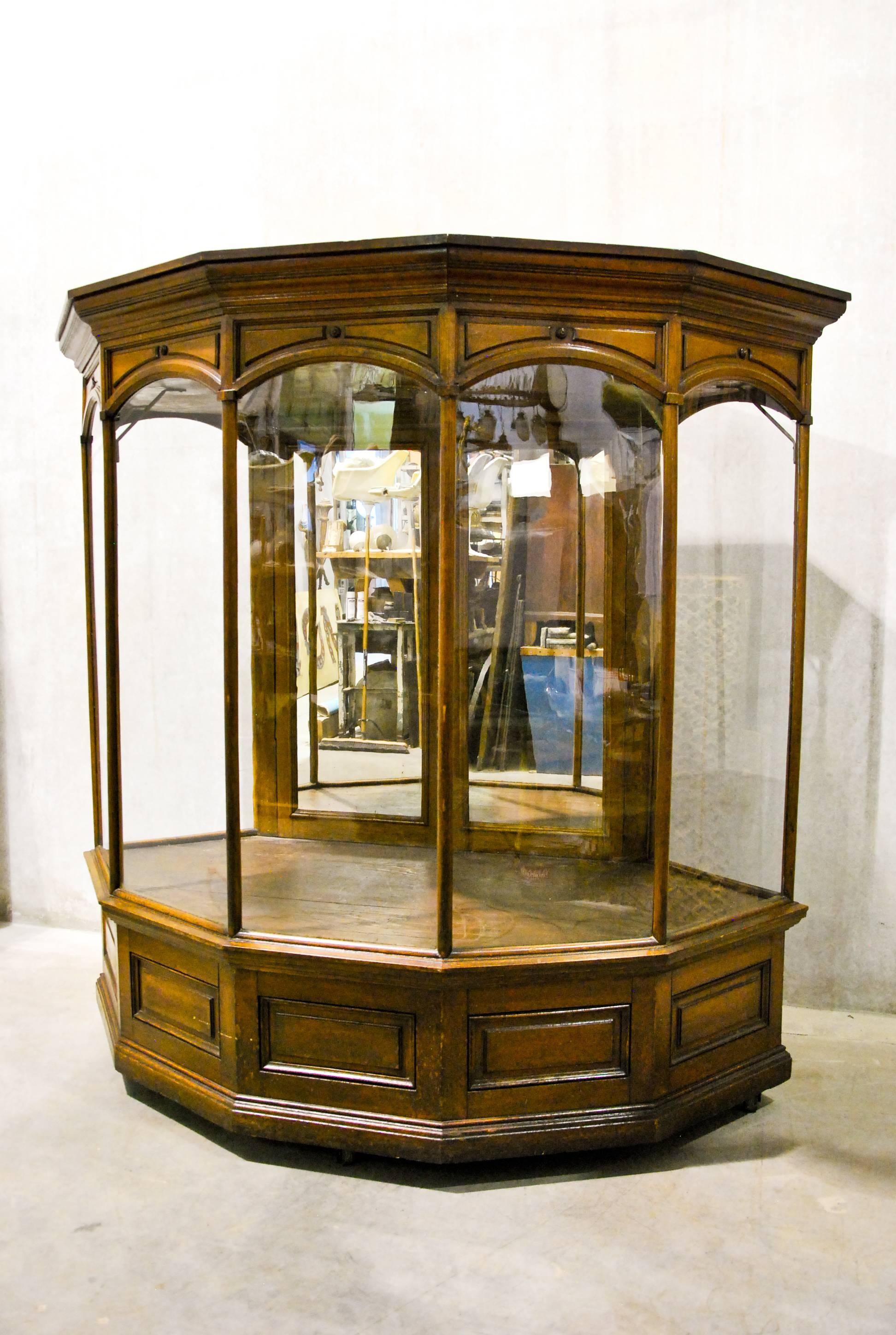 Rare, high quality oak-and-glass Victorian-era showcase with interior lighting. Original, untouched finish and absolutely one-of-a-kind. Once believed to be part of a store display for Smith and Wesson. This unique piece could house incredible