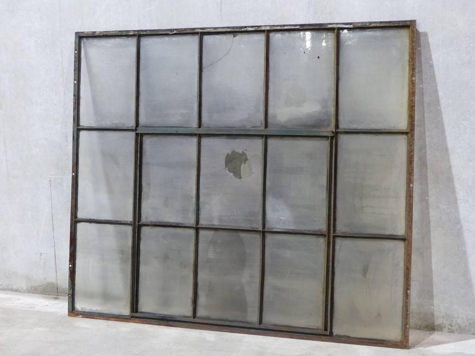 Set of 6 large industrial warehouse salvaged windows. With pivoting centre window