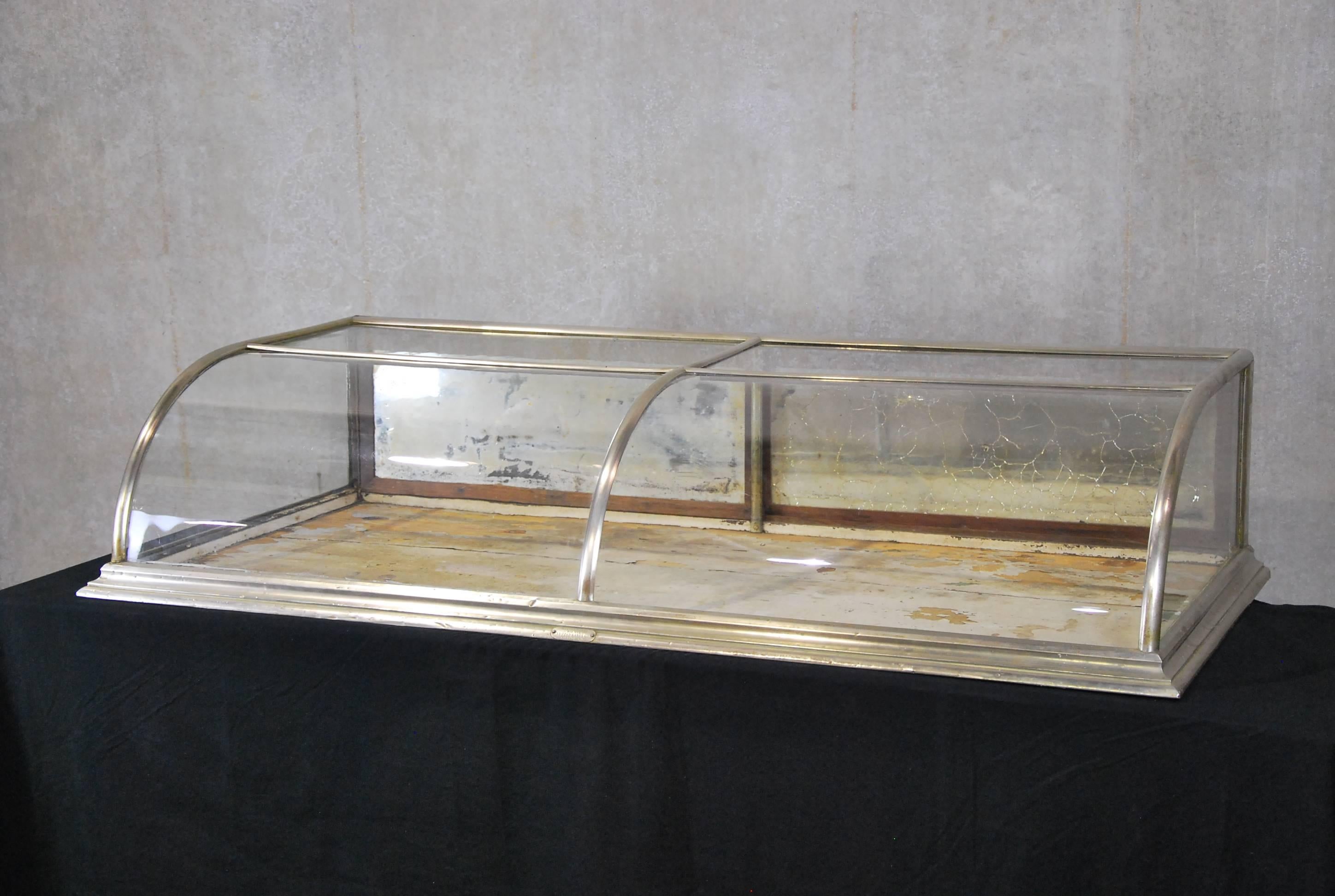 Very nice as found full functional working showcase manufactured by Lutted Candy co.
