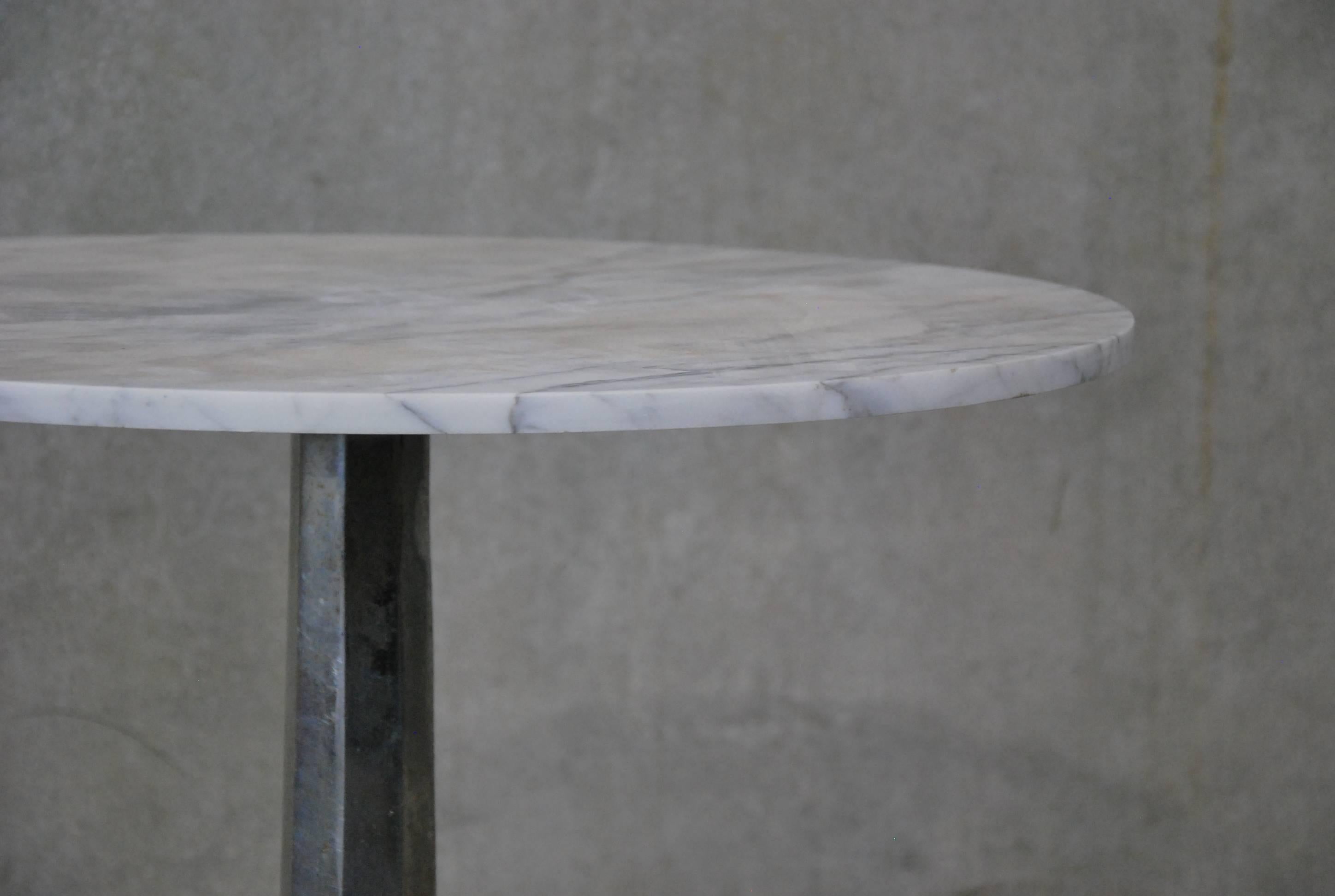 Cast base French bistro table with 30 inch marble top. Perfect seating height.
 