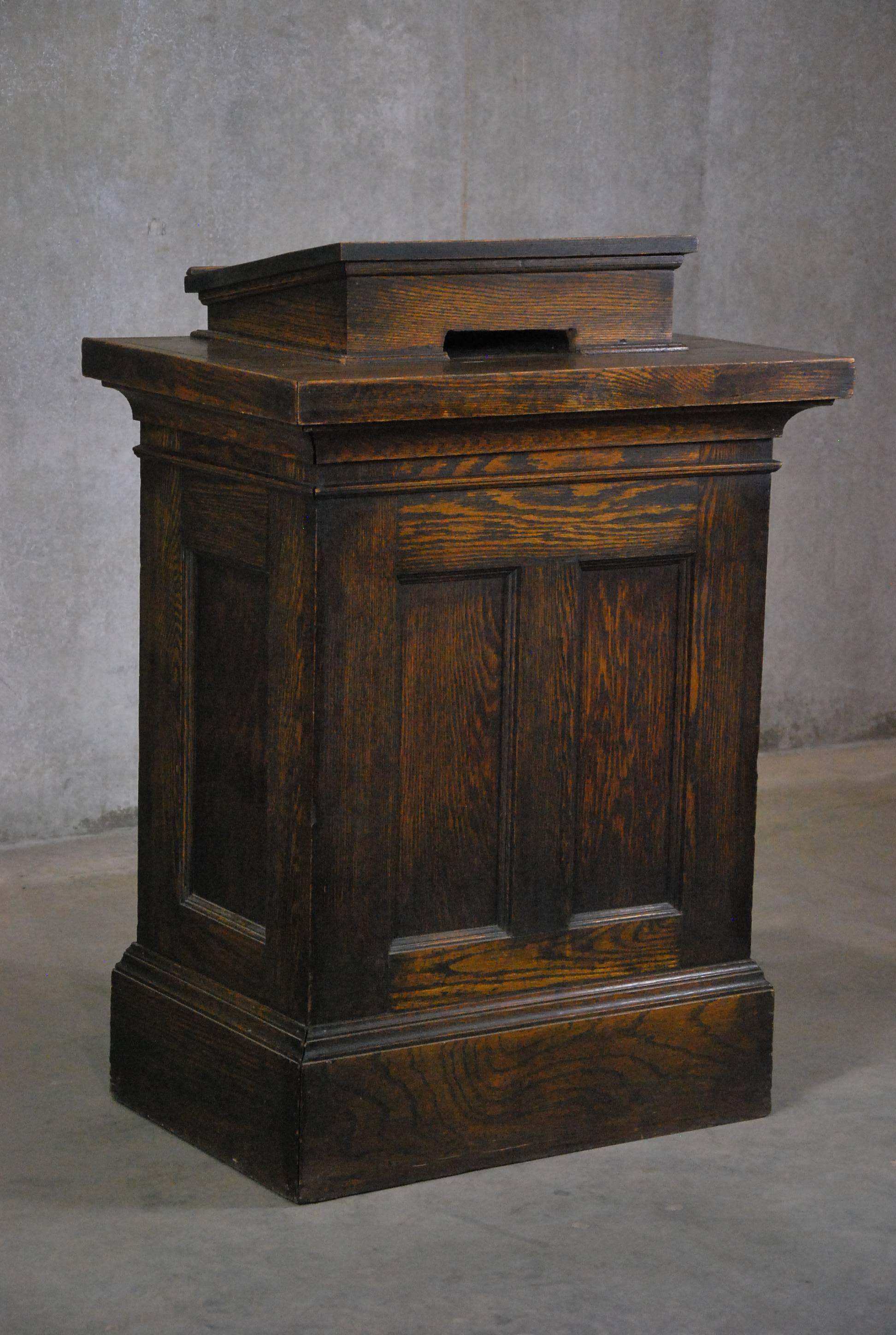 Very solid well built lectern ideal for a hostess stand in a restaurant. Multipanel construction retaining it's original finish.

Found in Ohio.