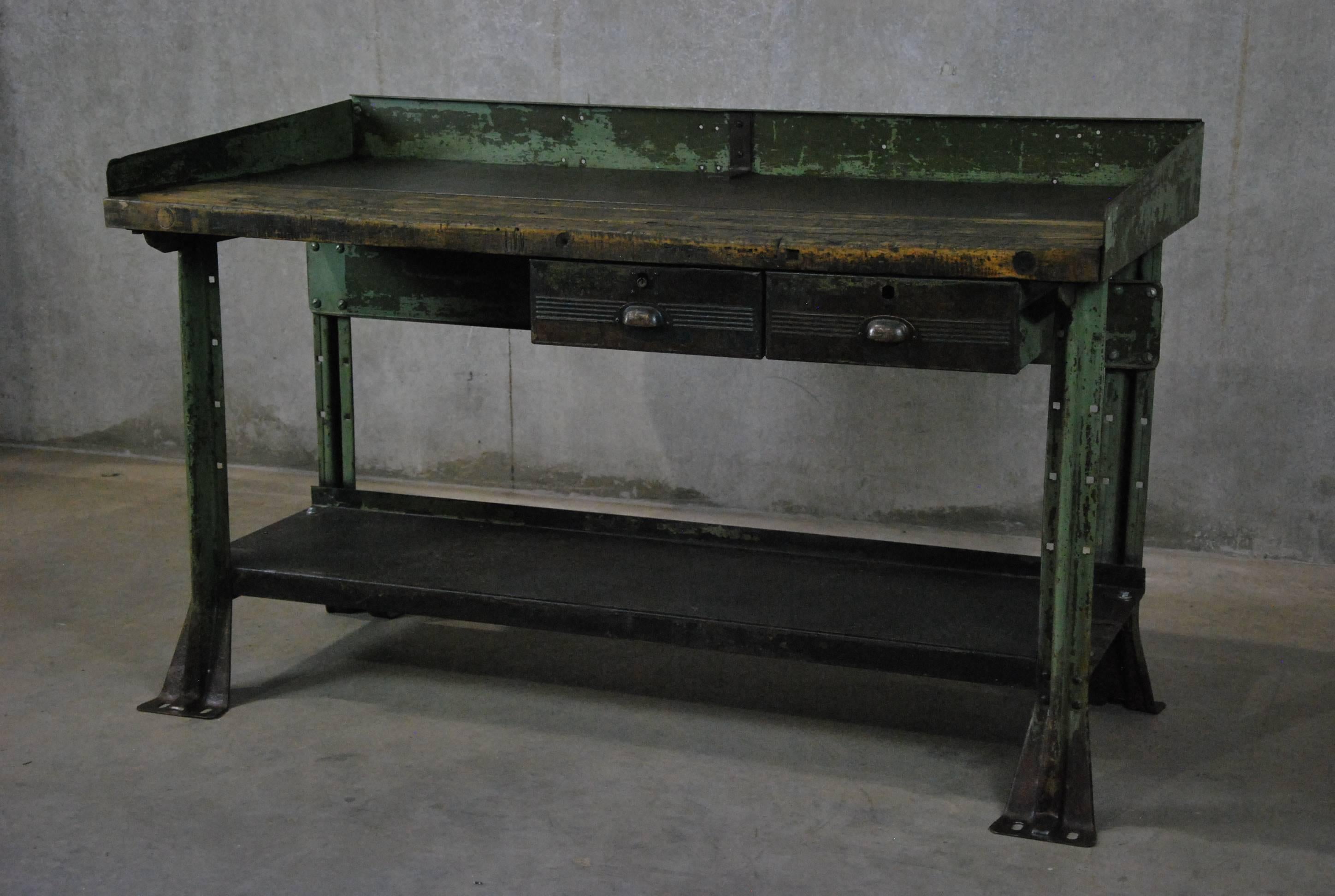 As found industrial work desk with full removable gallery and two working drawers. Top is a solid maple butcher block style with hot rolled steel insert.
Strong retention of original color.
 