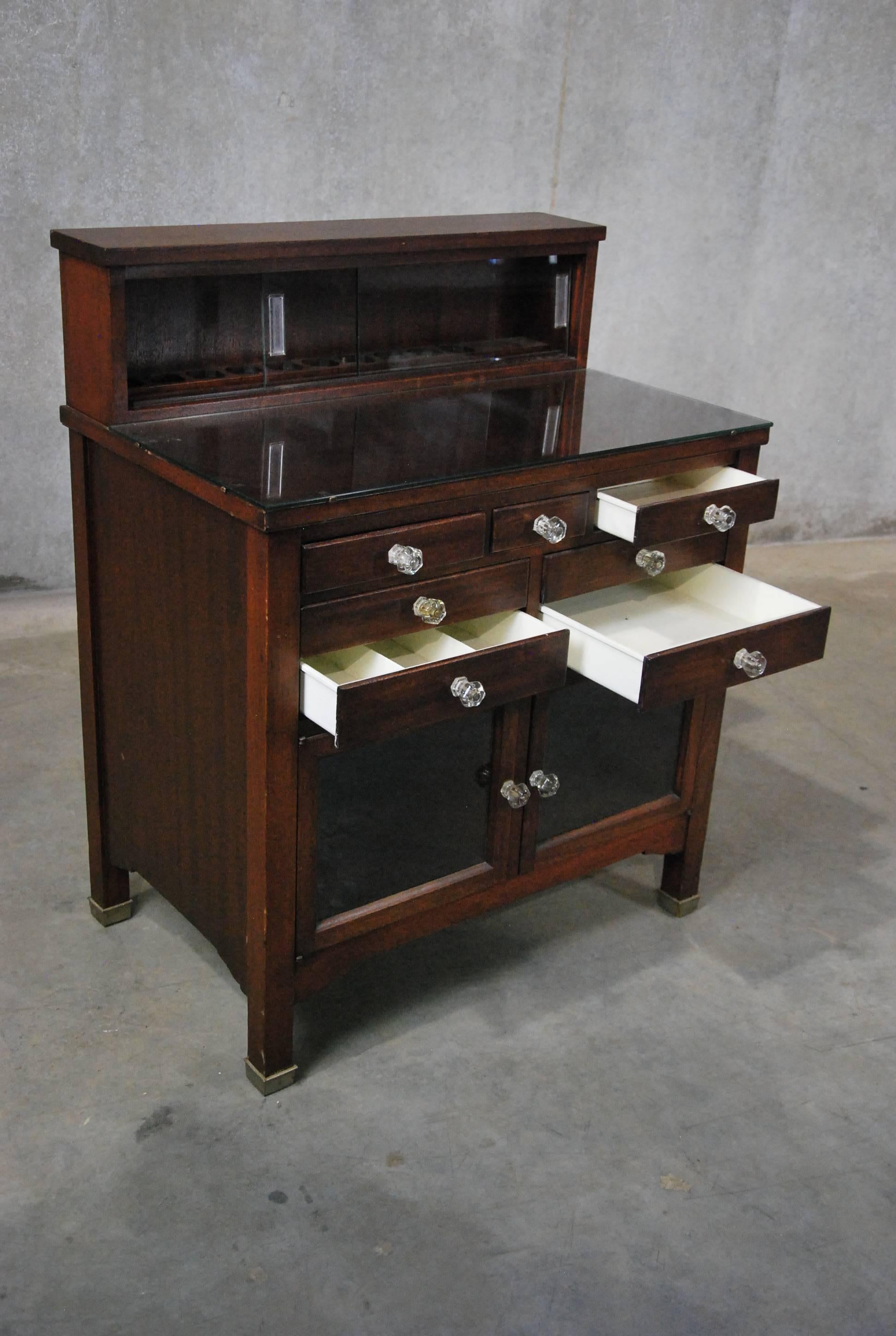 small antique dental cabinet