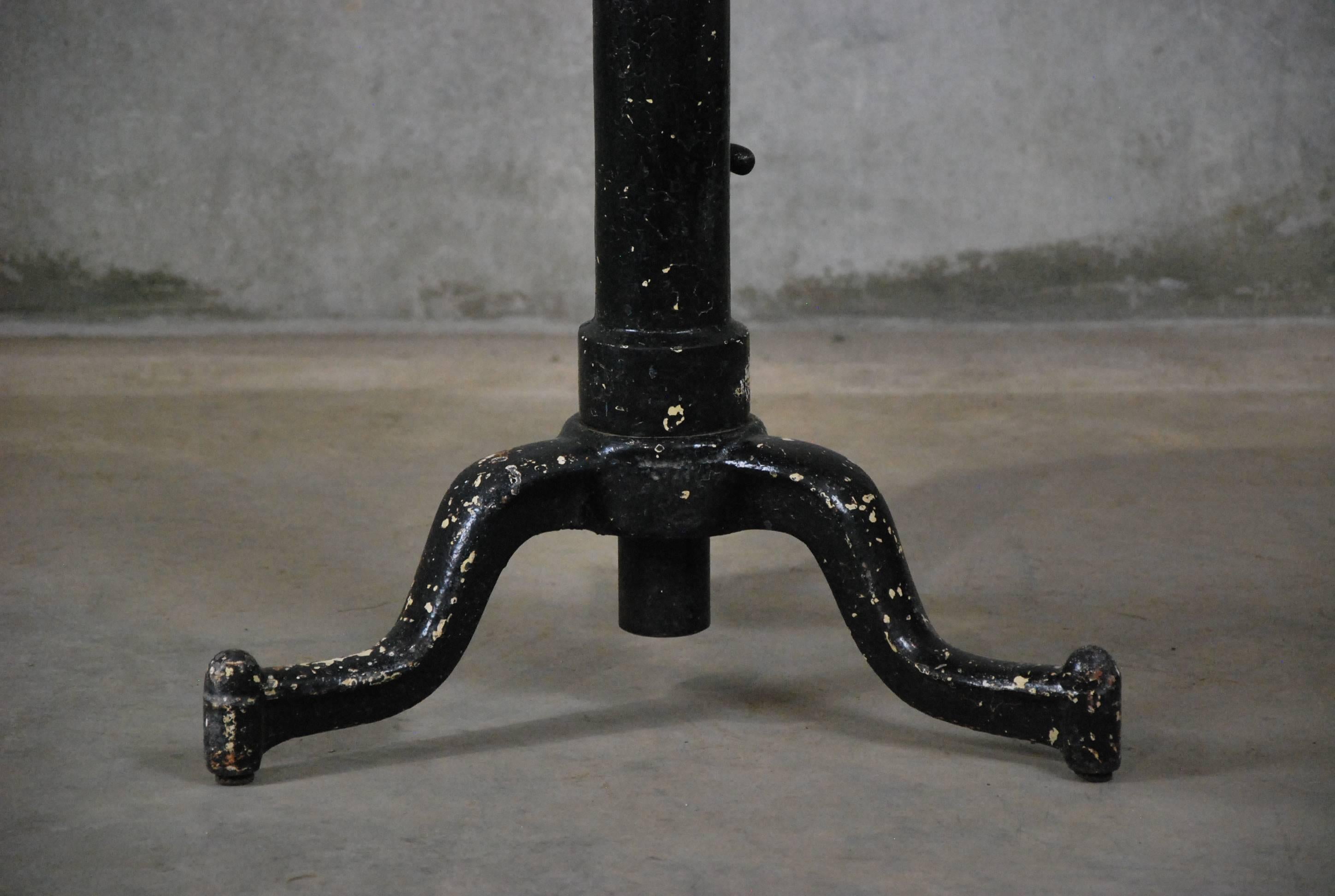 Tripod pedestal base with adjustable mechanism allowing for the movement of height between 22-34