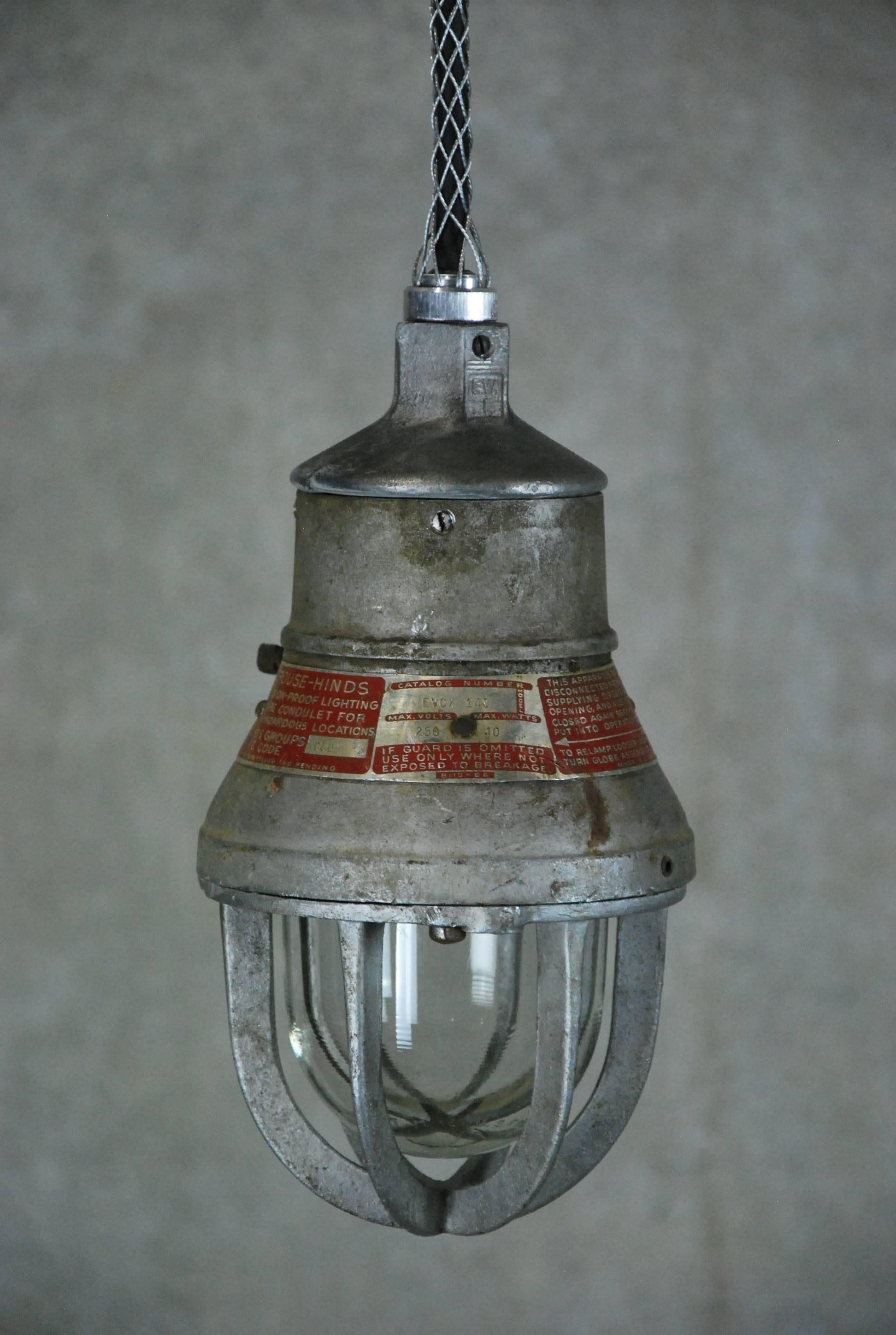 A pair of small Industrial pendants in cast aluminum with protective cage and solid glass insert. We have had many Industrial pendants but have not seen this size ever. Rewired CSA approved and ready for easy install.

in 1897, at age 25,