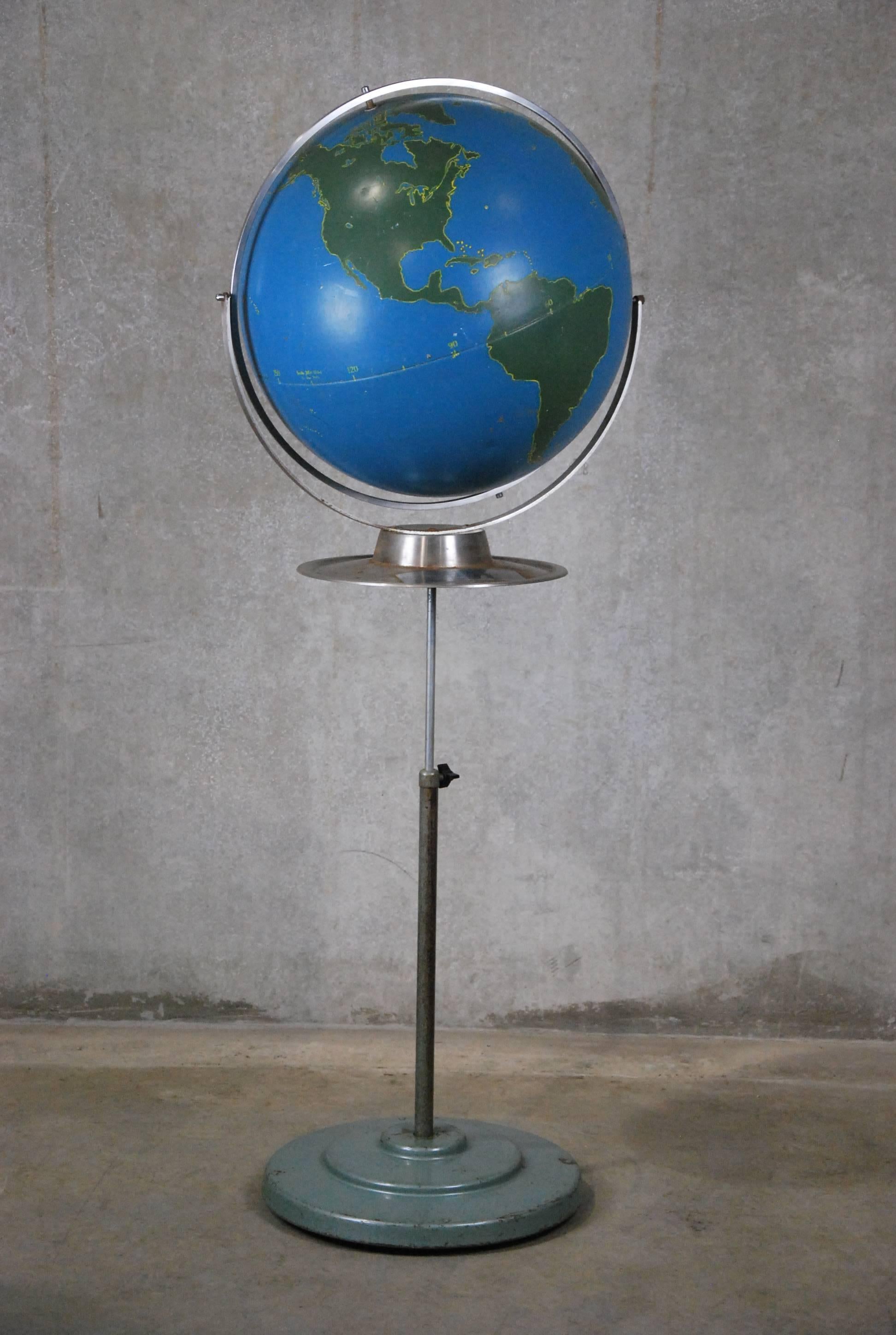 Very unusual military globe with adaptable telescoping stand.

A precision military training globe sold by “A. J. Nystrom or Maps Globes Charts Models” probably during the Korean War or later. The hollow steel orb delineates the continents,
