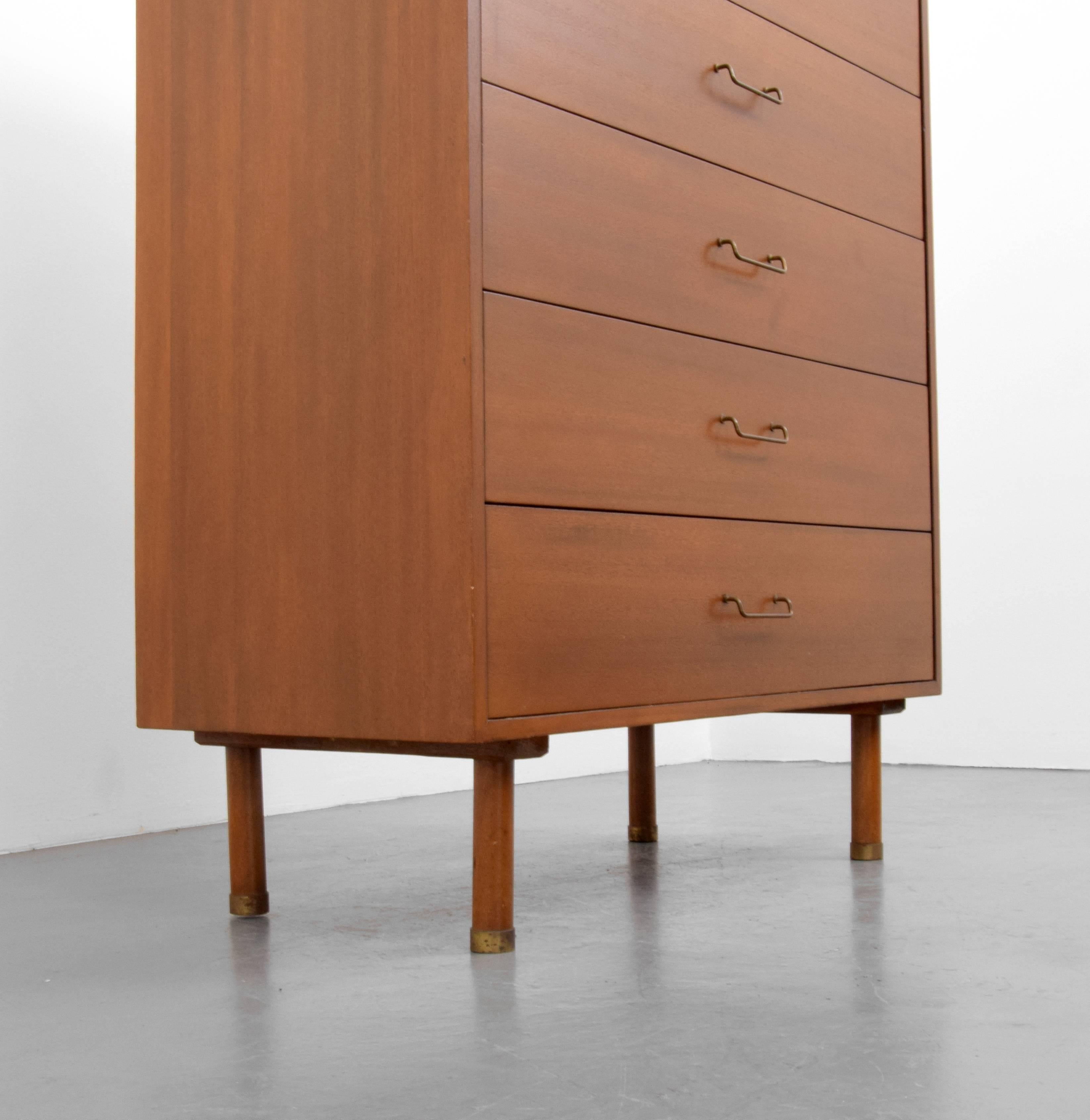 Chest/ dresser with six drawers by Harvey Probber.

Harvey Probber preferred simple lines in his designs. He would often use hardware and color in upholstery or wood to add contrast and emphasize the details.  He was known for his large sweeping