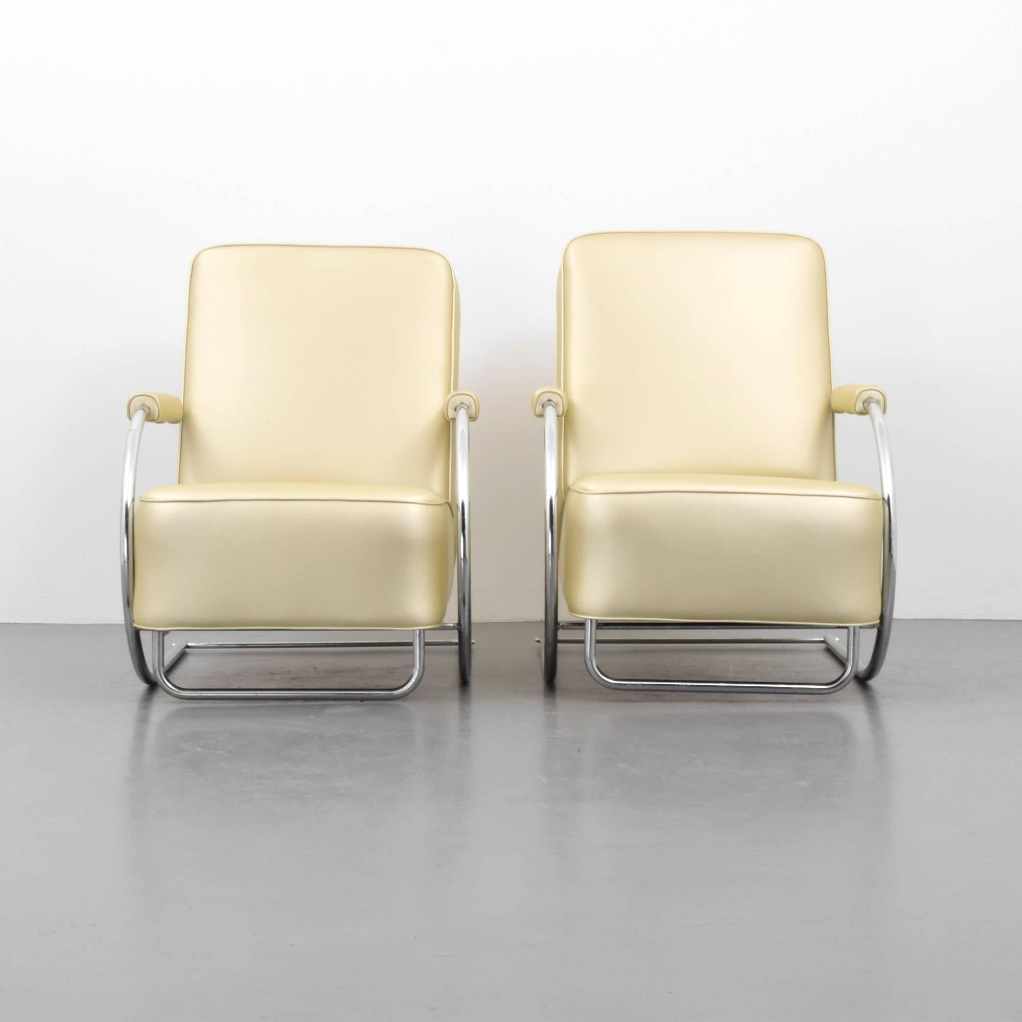 Pair of lounge chairs in the manner of KEM Weber.