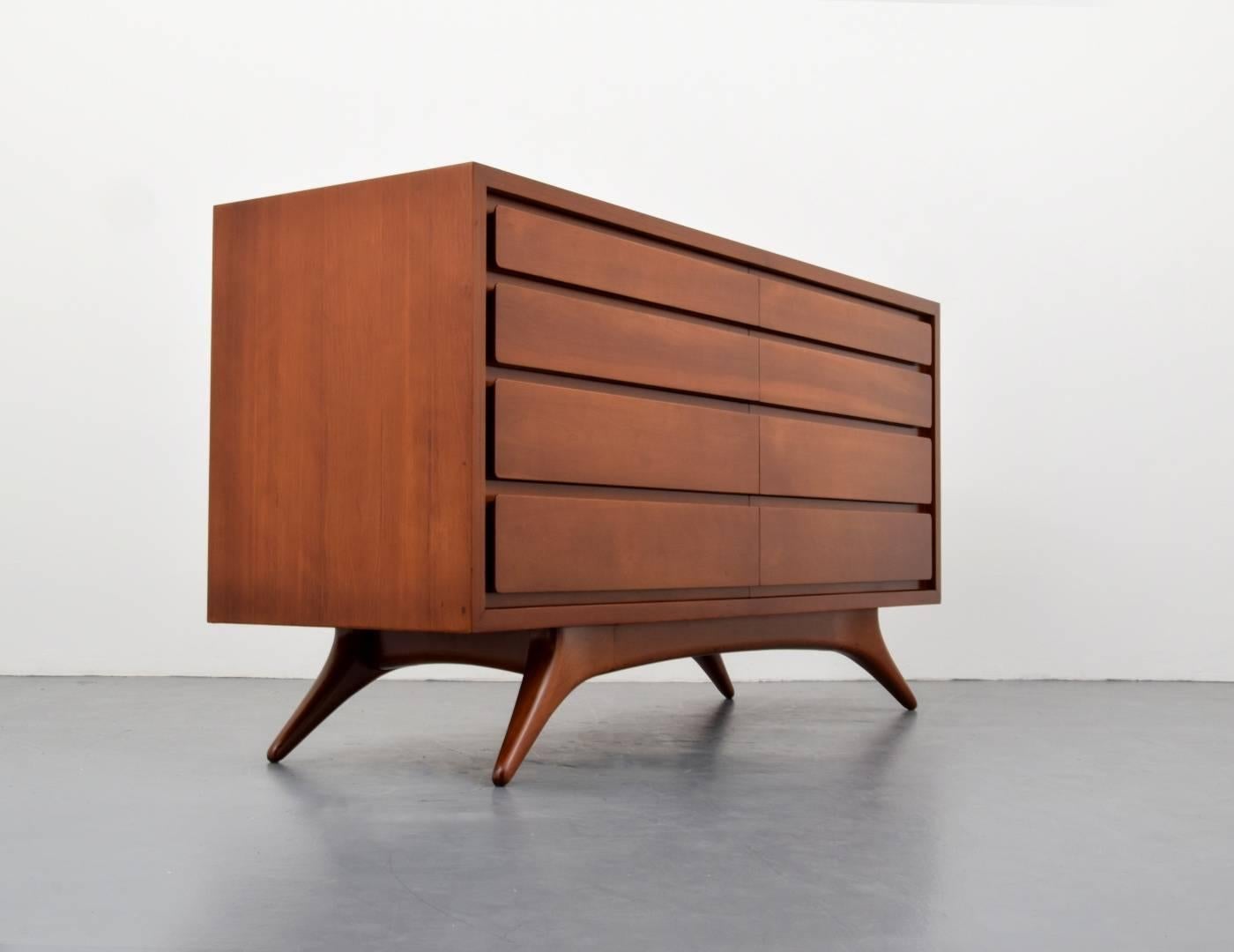 Rare and early cabinet or dresser with eight floating drawers on sculpted legs by Vladimir Kagan. Chest is similar to models #3401 and #3501. Cabinet is from a single-owner collection of early Vladimir Kagan furniture (please see the other pieces