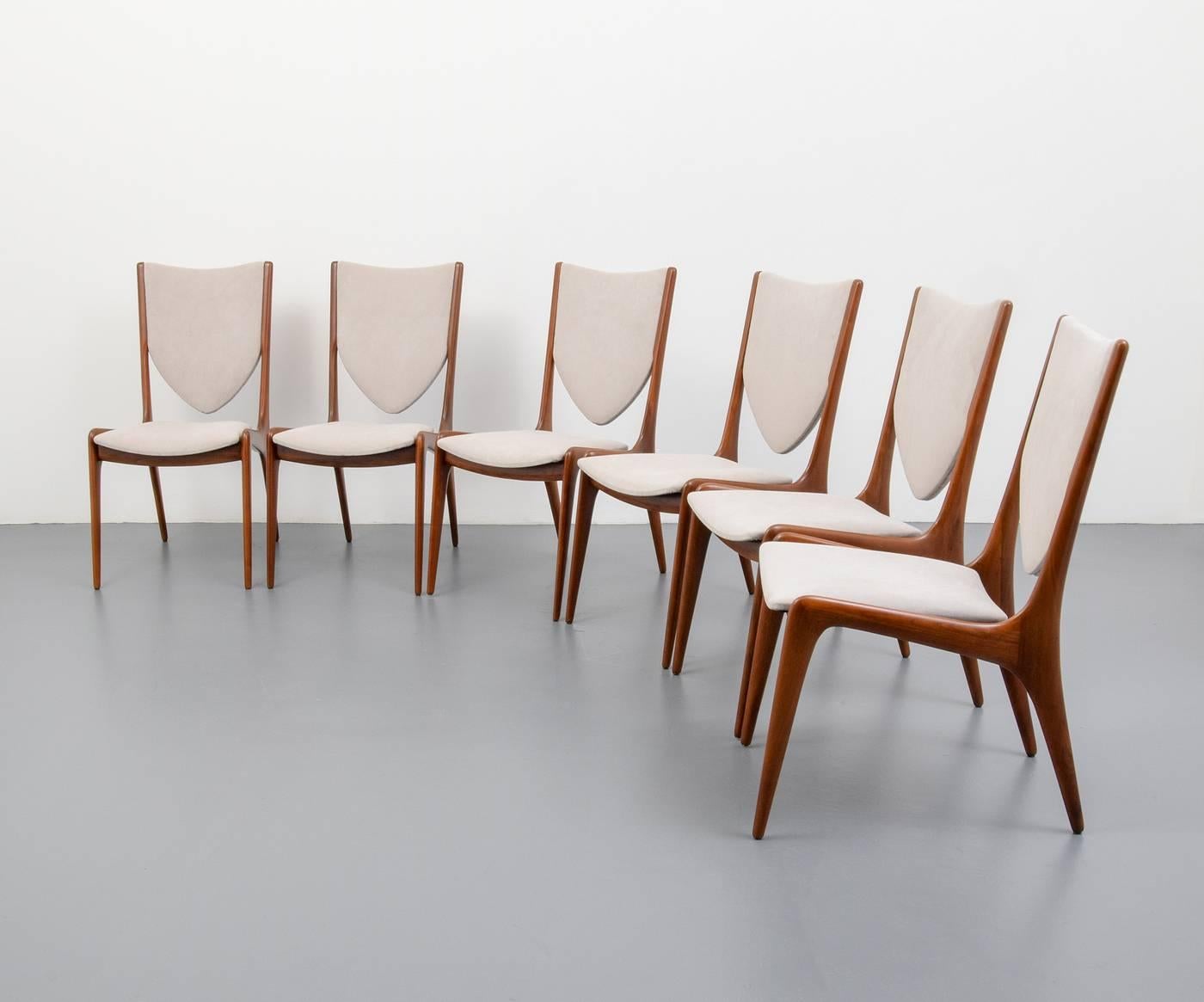 Chairs are model VK103. Set is comprised of two arm chairs and six side chairs. Reference: The Complete Kagan, Vladimir Kagan, pg. 265. Provenance: Rago Arts, 10.27.2013, Lot 1324. Kagan-Dreyfuss, Inc. brand to one or more chairs.

Dimensions(H,