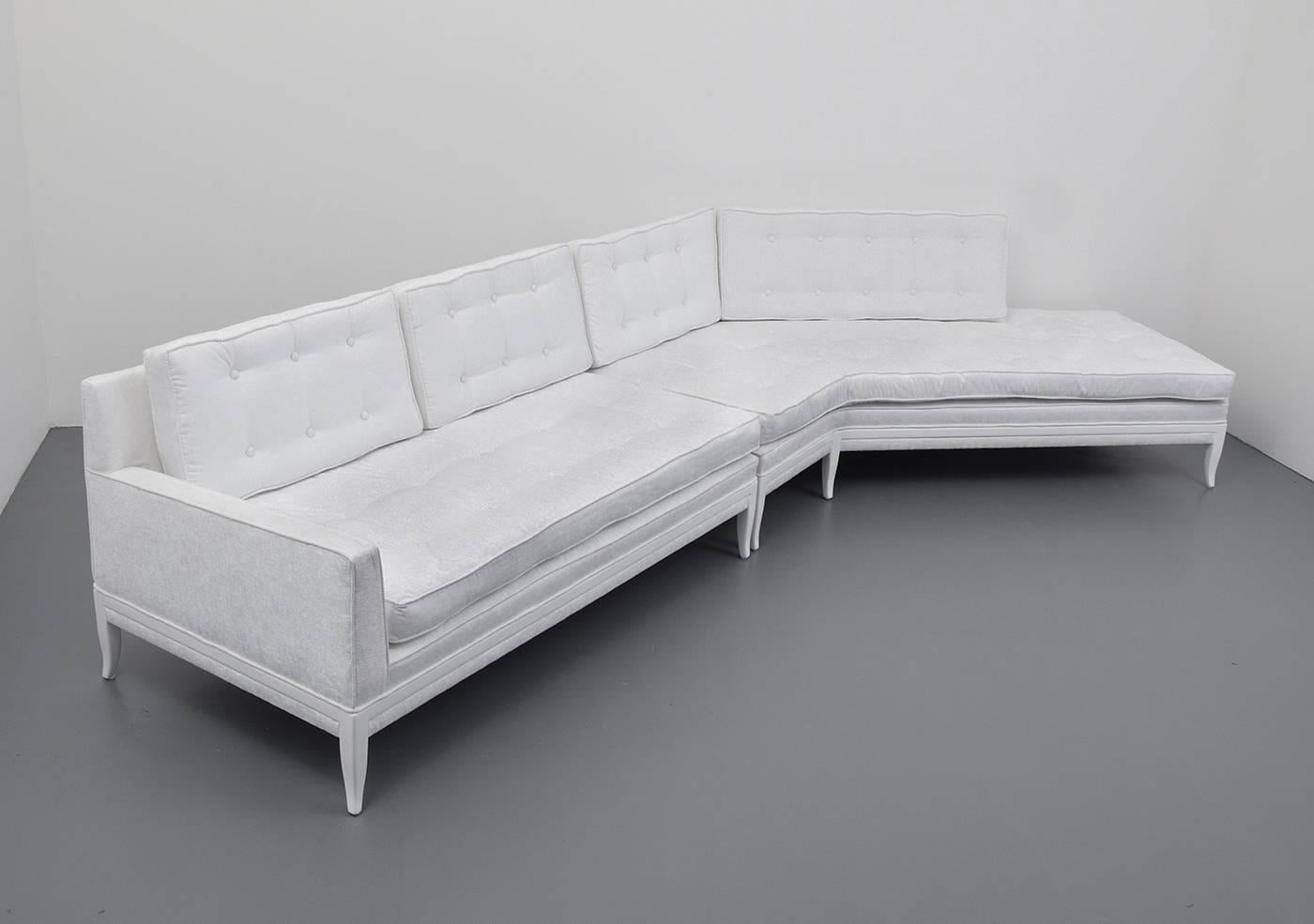 Large two-piece sectional sofa by Tommi Parzinger for Parzinger Originals. The sofa has been refinished and reupholstered.
 