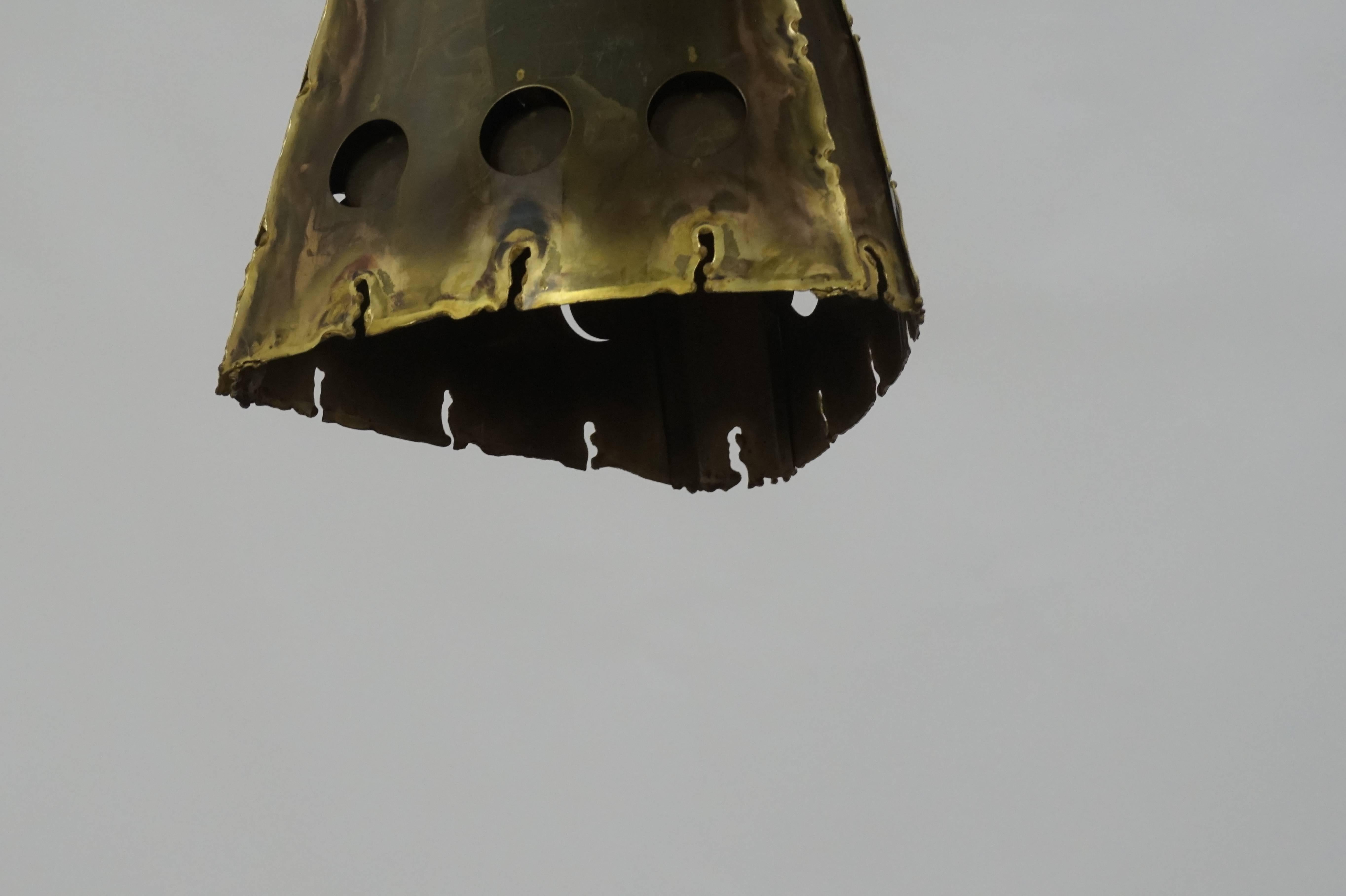 Acid treated and etched brass pendant light by Holm Sorensen.