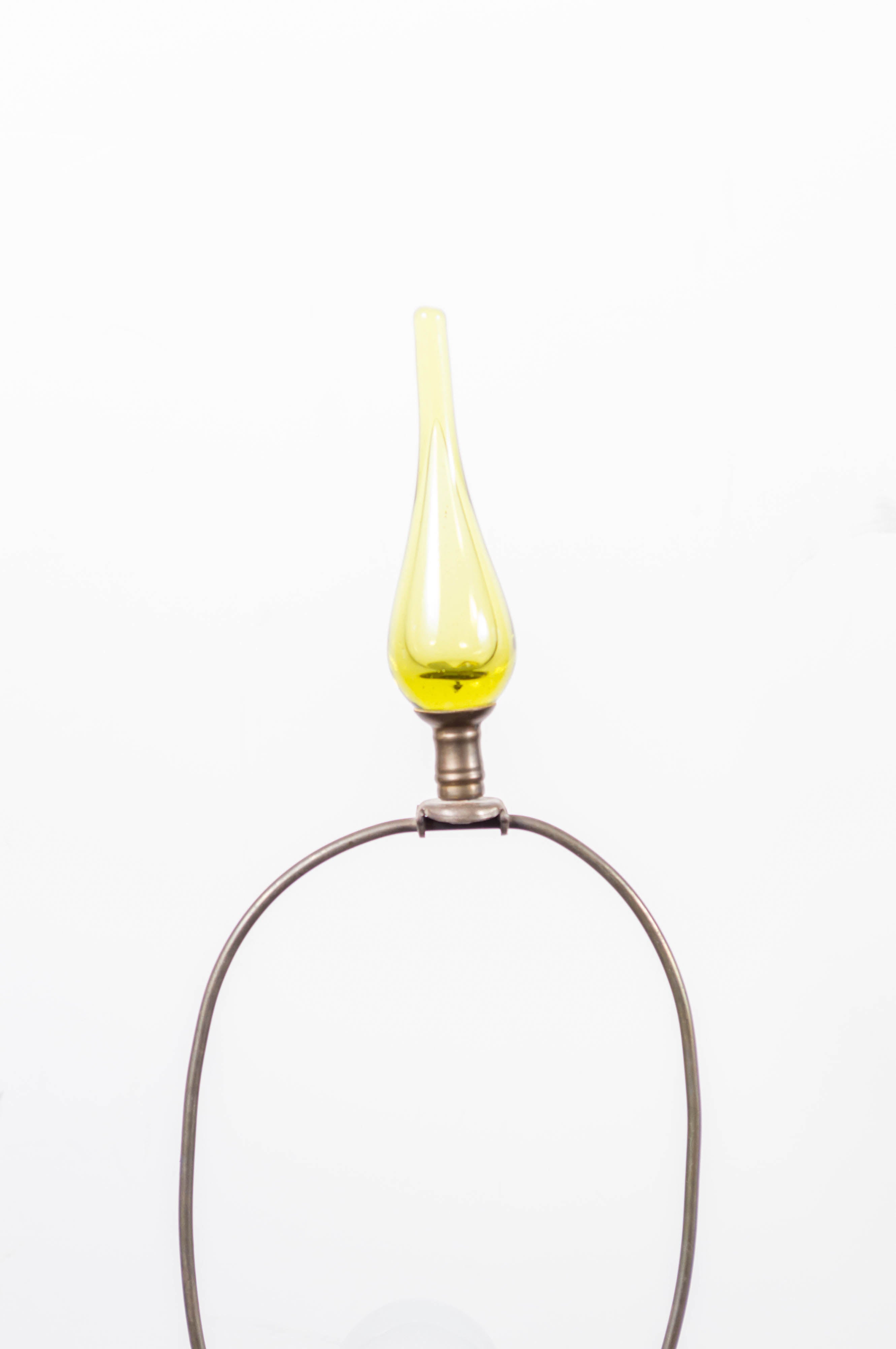 Pair of Mid-Century Modern lime Blenko Glass lamps with matching finials and original harp.
