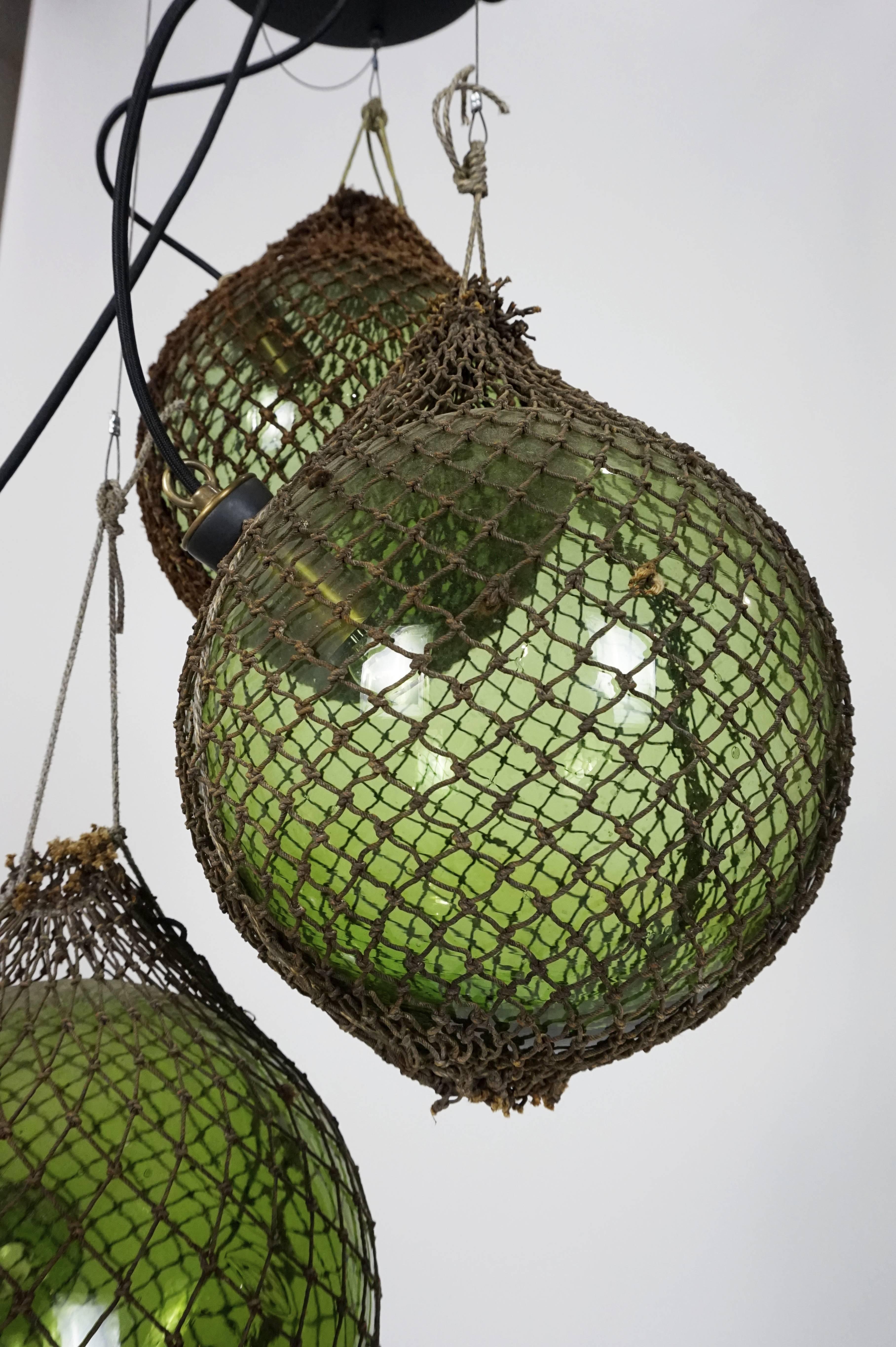 Mid-20th Century Green Glass Antique Japanese Fishing Floats 3-Light Pendant