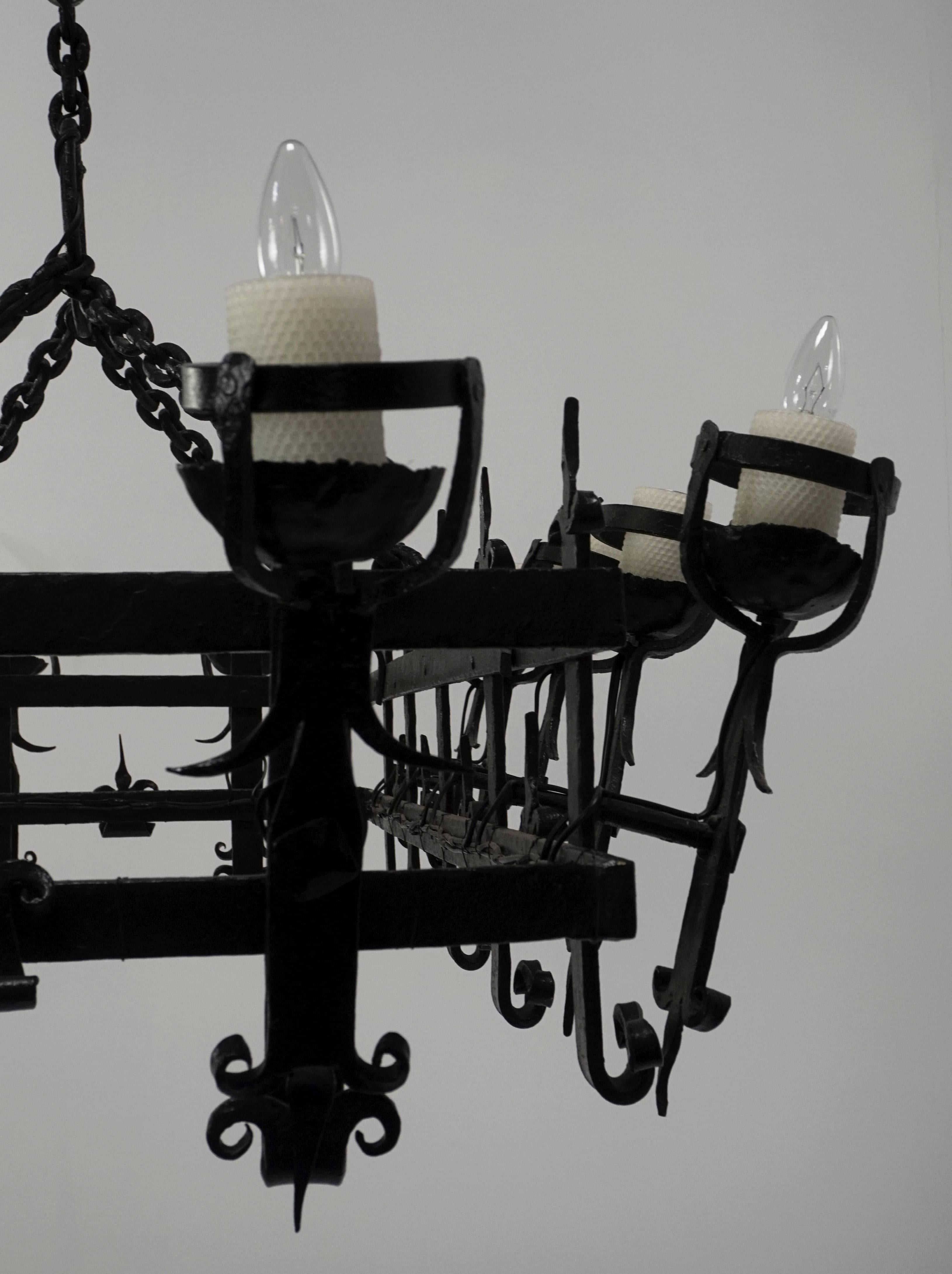 Early 20th Century Monumental 14-Light Henry III Style Hand Wrought Iron Chandelier For Sale