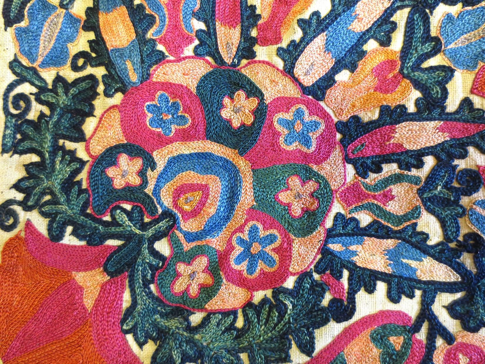 This is a lovely antique Suzani textile from Uzbekistan, circa 1850s, with silk embroidery on linen fabric.