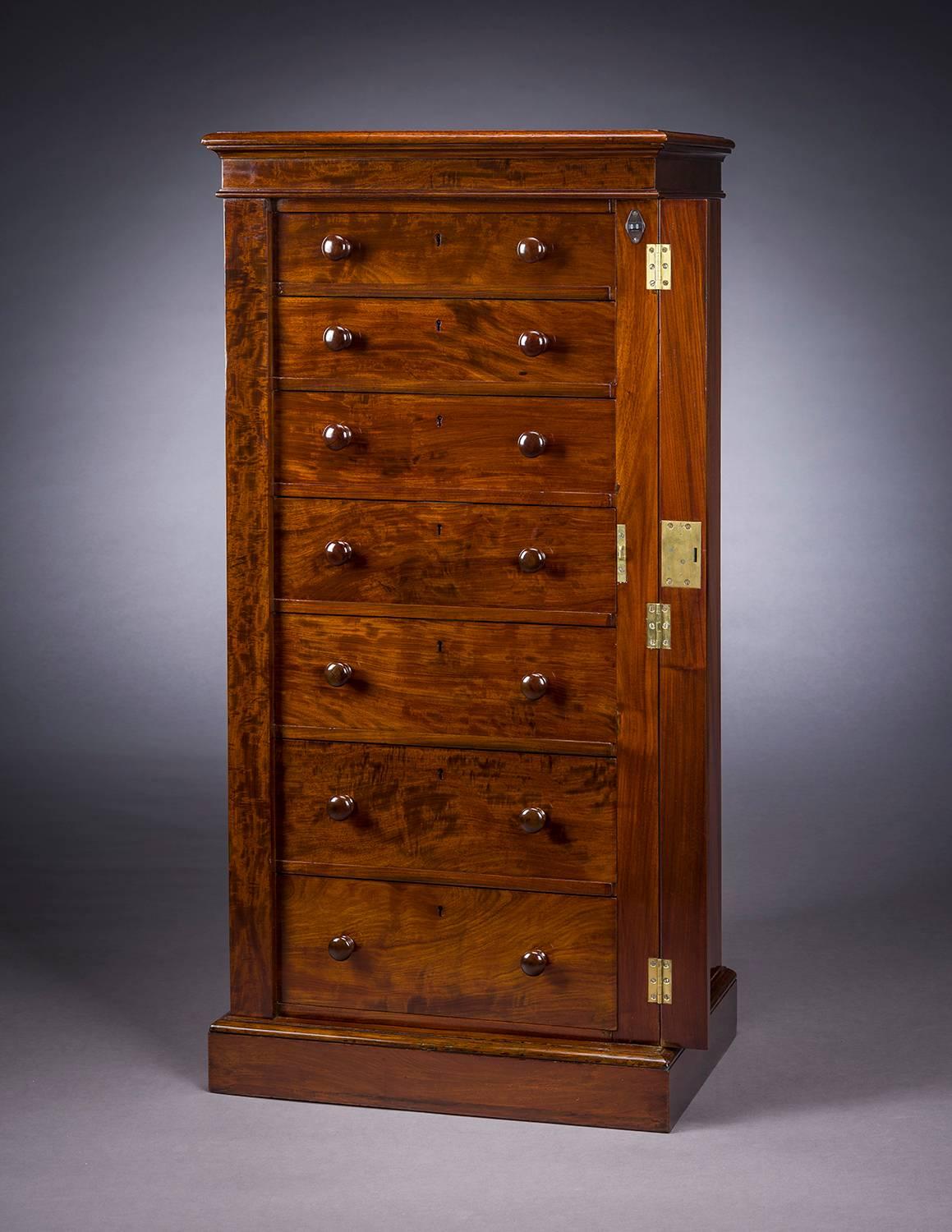 Boston, Massachusetts
Seven-drawer tall chest, circa 1825.
Mahogany (secondary woods: mahogany, pine, and poplar)
Measures: 45 5/8 in. high, 27 5/8 in. wide, 14 5/8 in. deep 
Inscribed (on six drawer locks): SECURE; (on seventh lock): CHUBB’S /