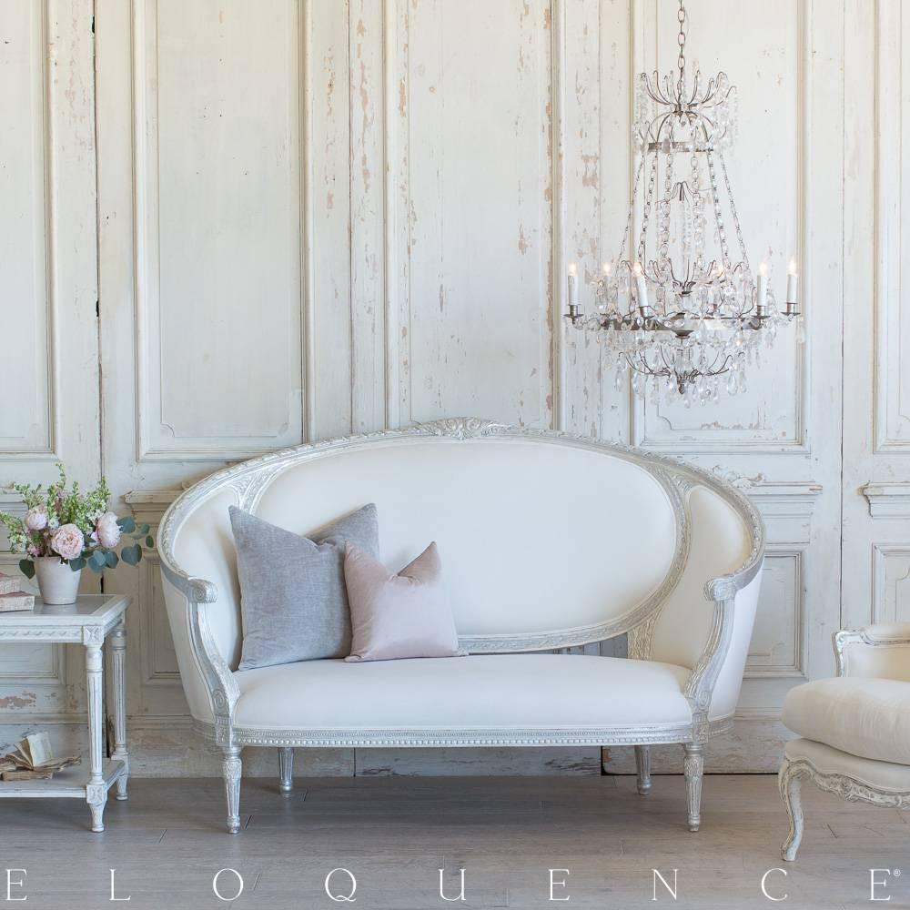 Versailles canape sofa in bright silver leaf finish with fine white linen upholstery. A beautiful curving shape with classic hand-carved detailing. Enjoy the comfortable proportions and glamorous appeal!