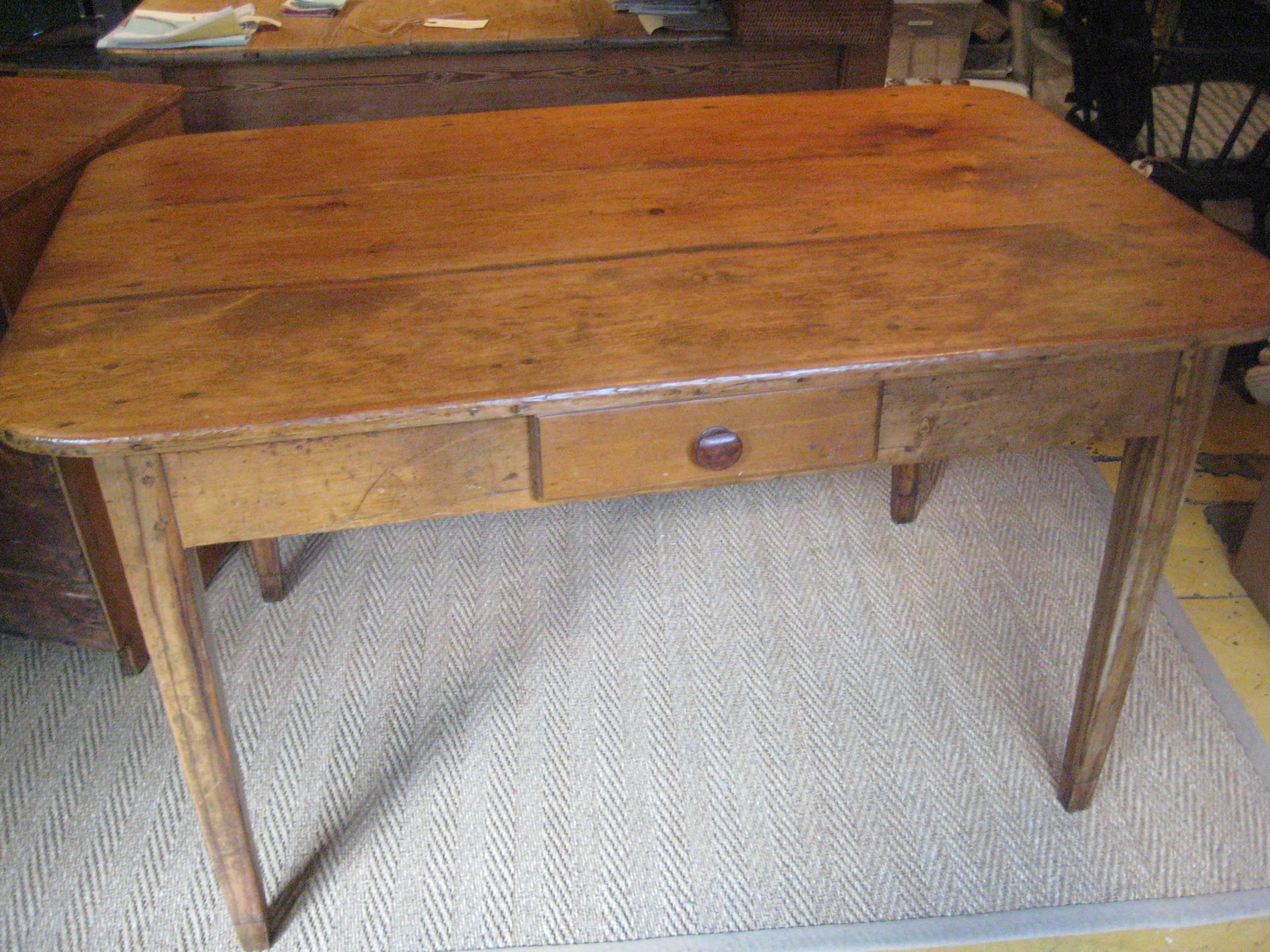 Pine Writing Table with curved corners and one drawer.
