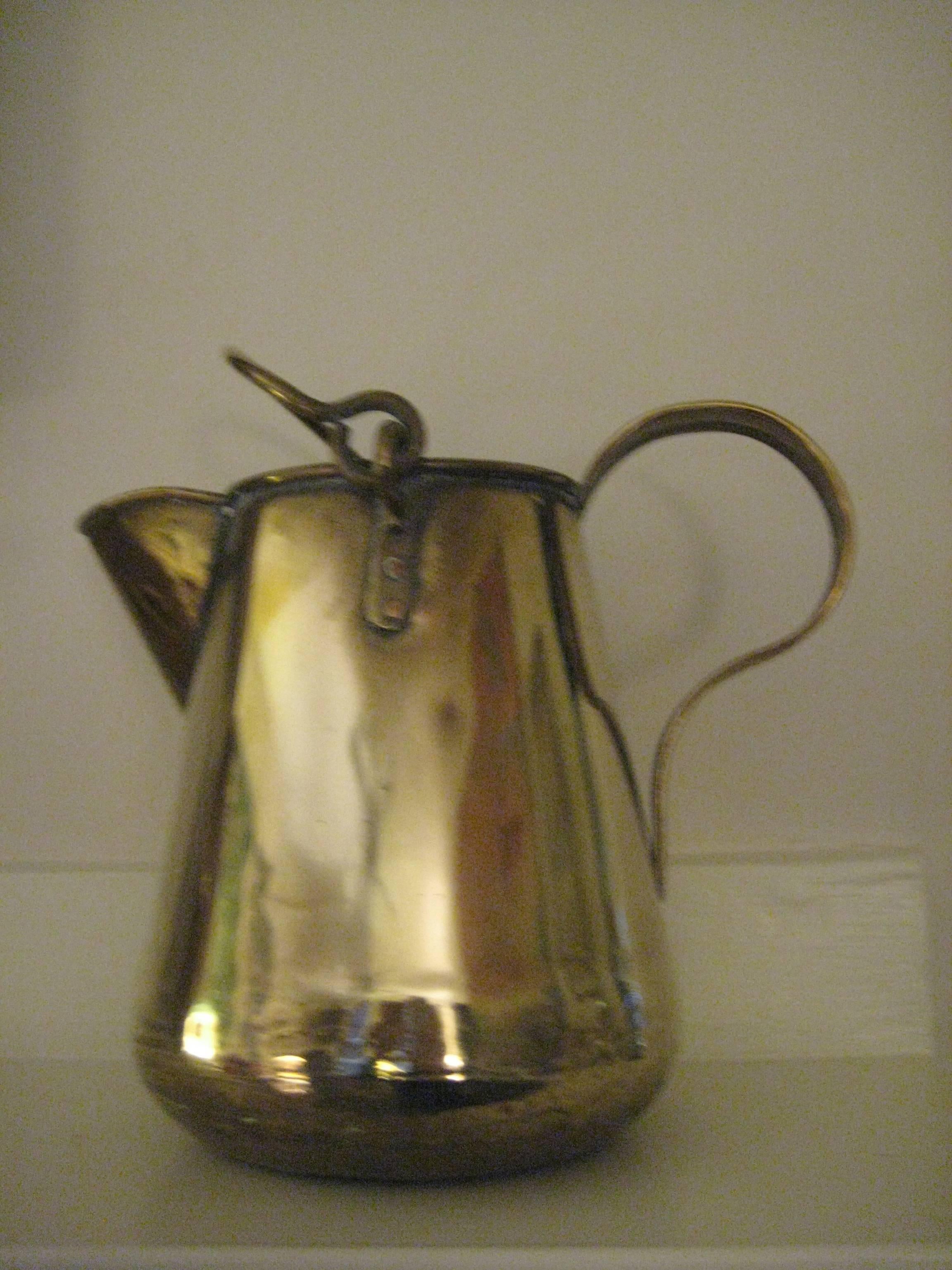 Brass Pitcher with handle.