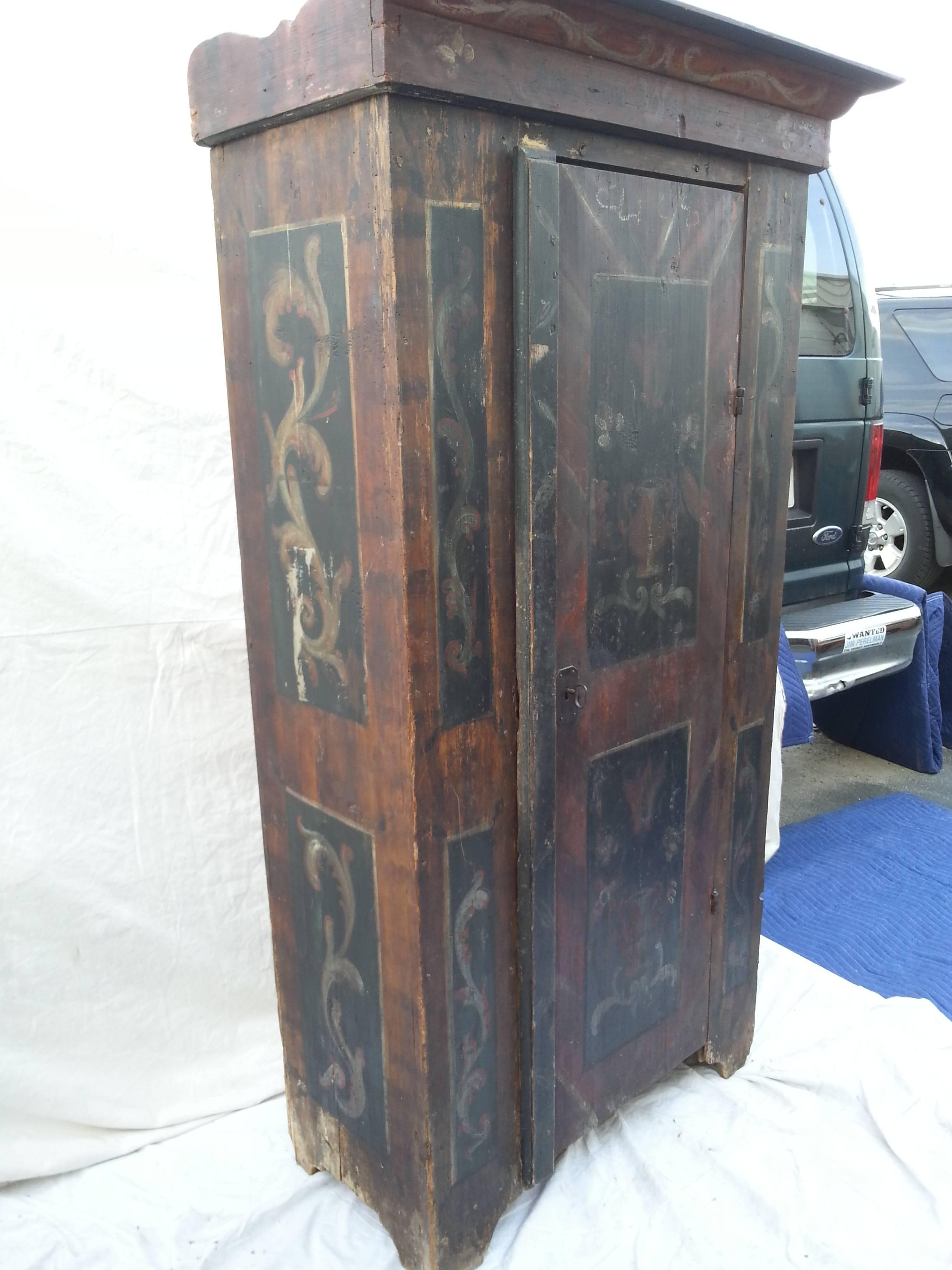 European decoratively painted armoire.
