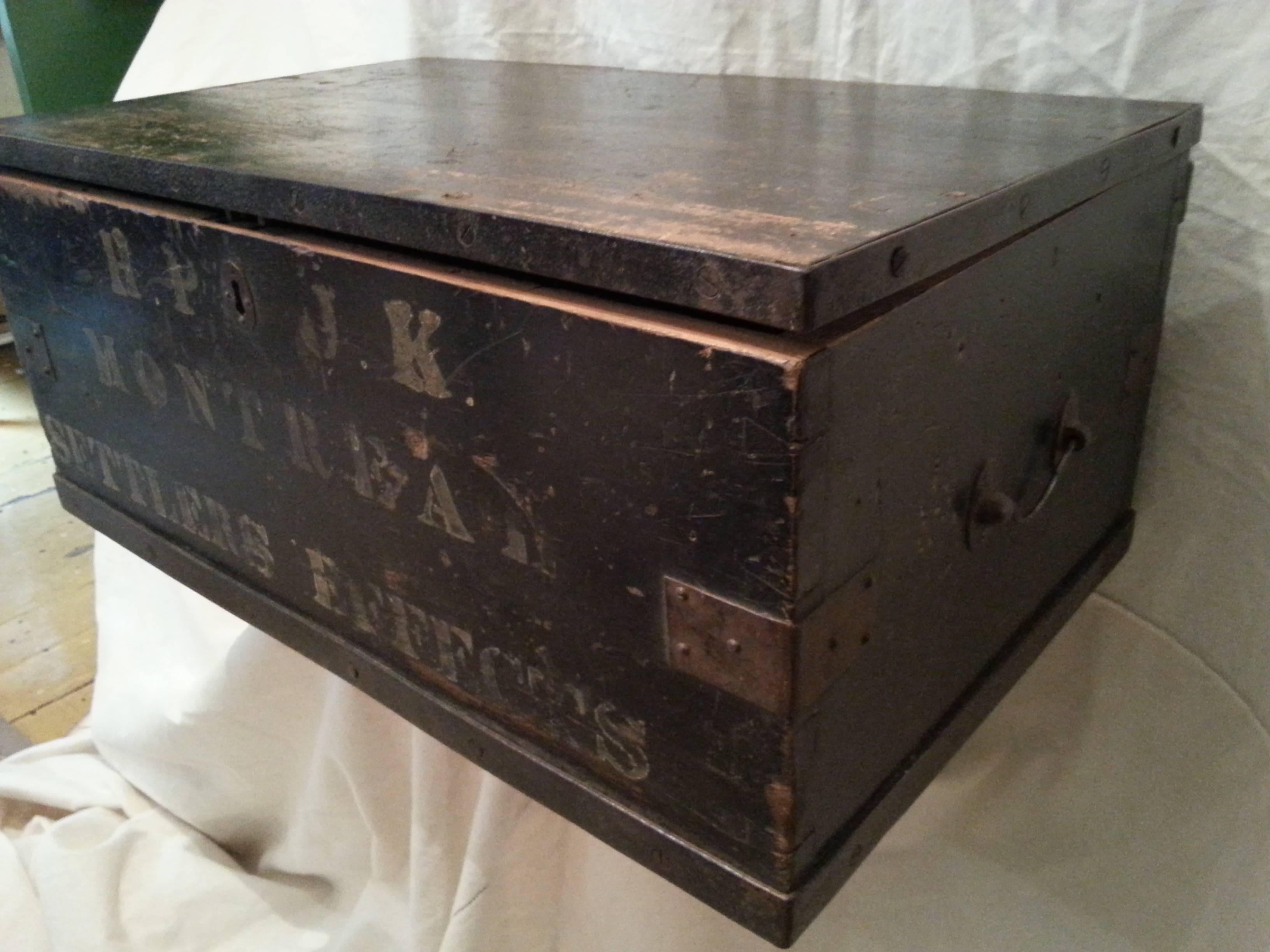 Montreal travel chest in original black paint with original stamped letters. H.P.O.J.K Montreal Settlers effects.