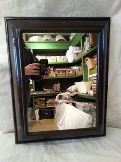 Antique Mahogany cushion mirror