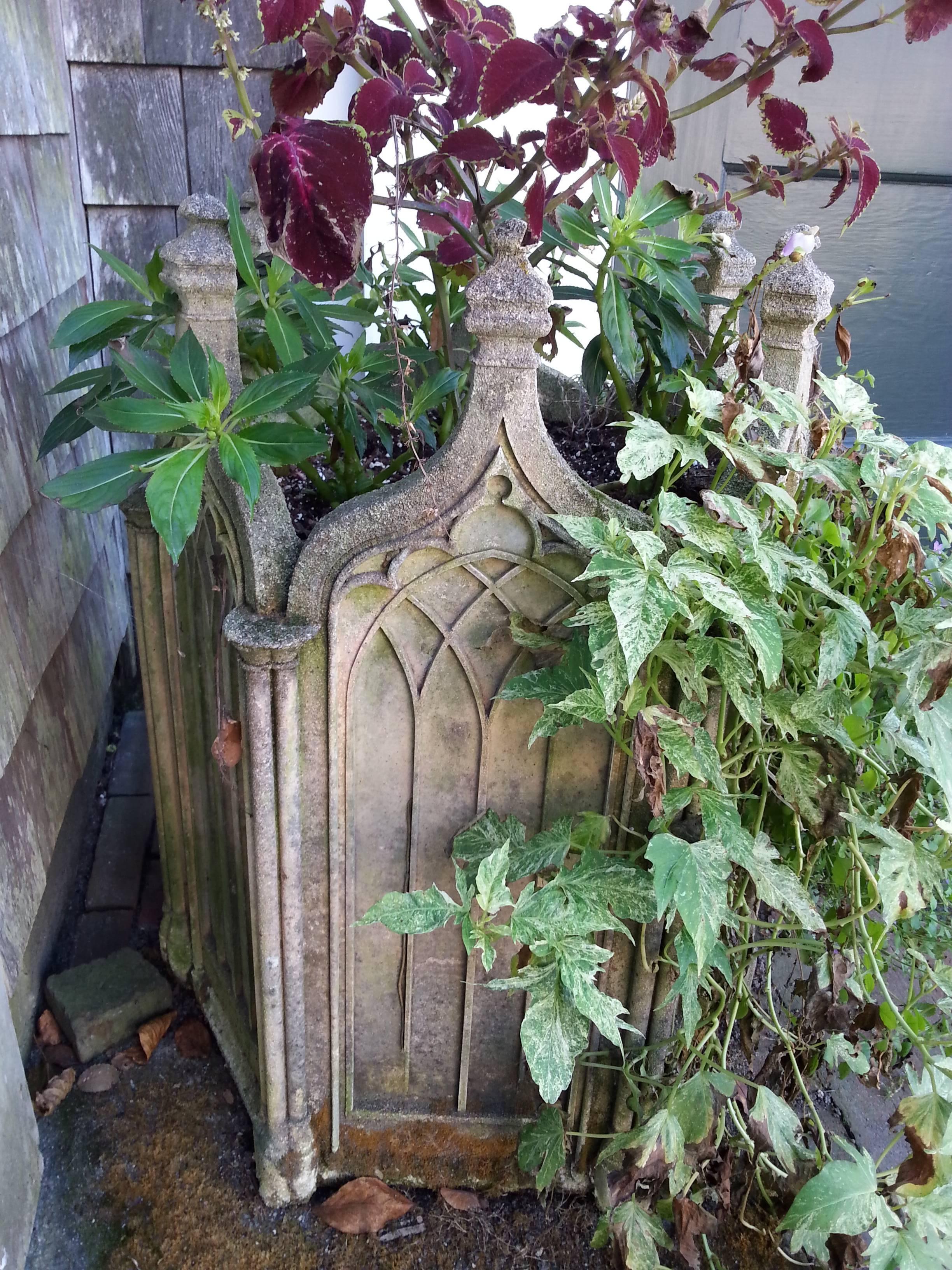 Gothic concrete planter. 6 sides, beautifully aged.