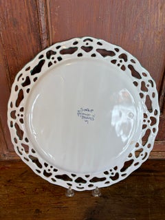 French Openwork Charger with Wide Lace Rim in Sage Green Over a Plain White Wall
