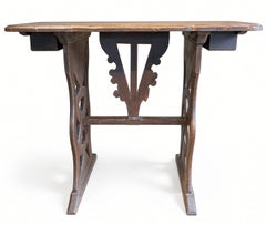 Early 20th Century Carved Trestle-Base Sewing Table with Twin Drawers