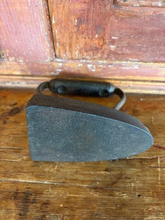 "UDX" Sad Iron Doorstop