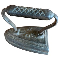 "UDX" Sad Iron Doorstop
