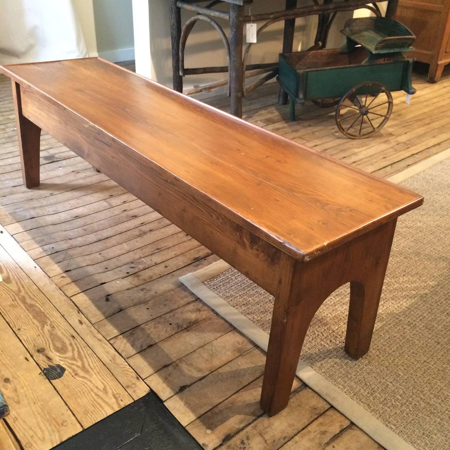Former late 19th century, early 20th century school desk repurposed as coffee table.