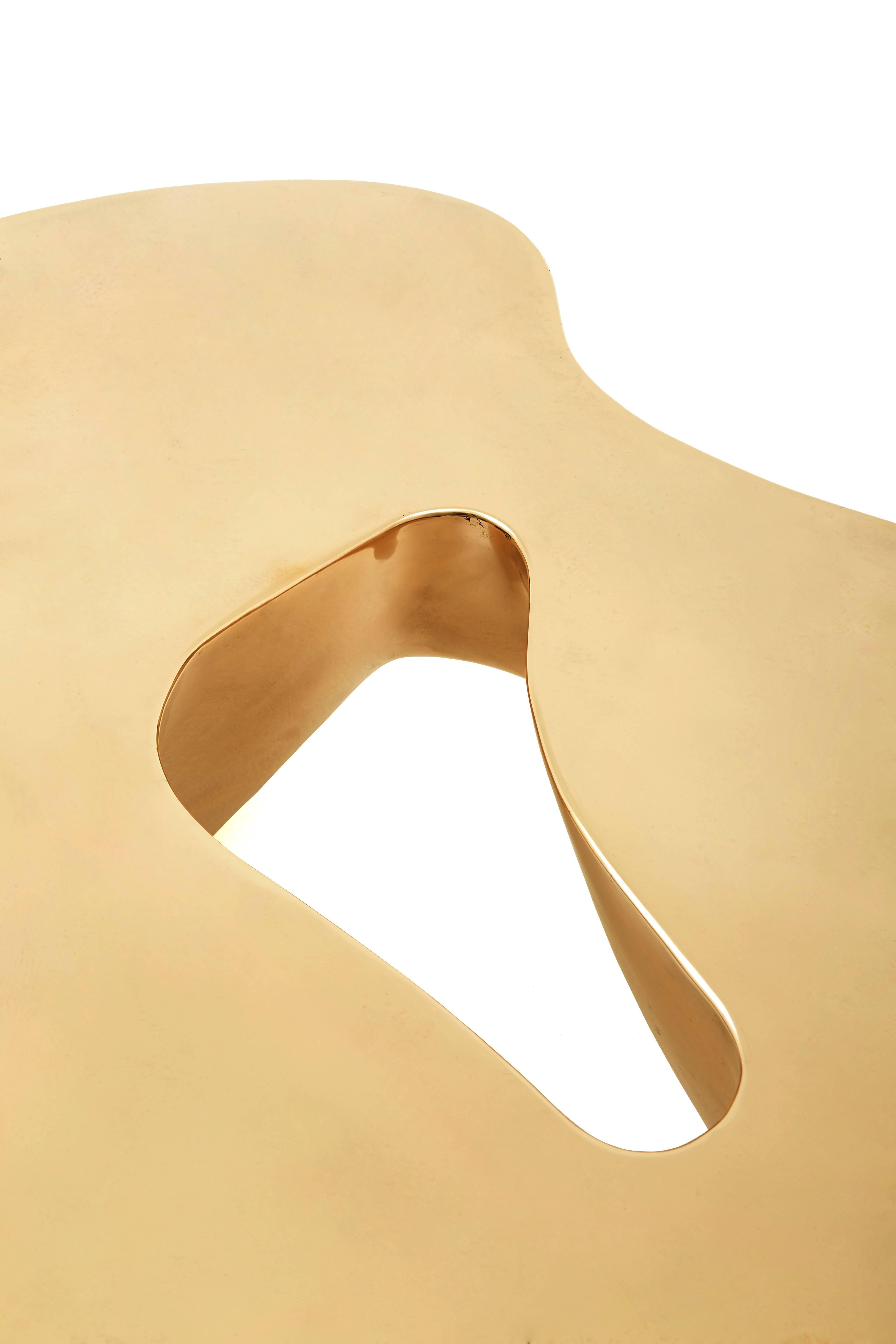 The metal version of Quark. Low table in Bronze. 

Limited Edition of 7 + 2 AP polished bronze.
Larger sizes available as well as bronze finishes.
2014.

Made in Italy.
The Quark series of low tables is an exploration of materials and production