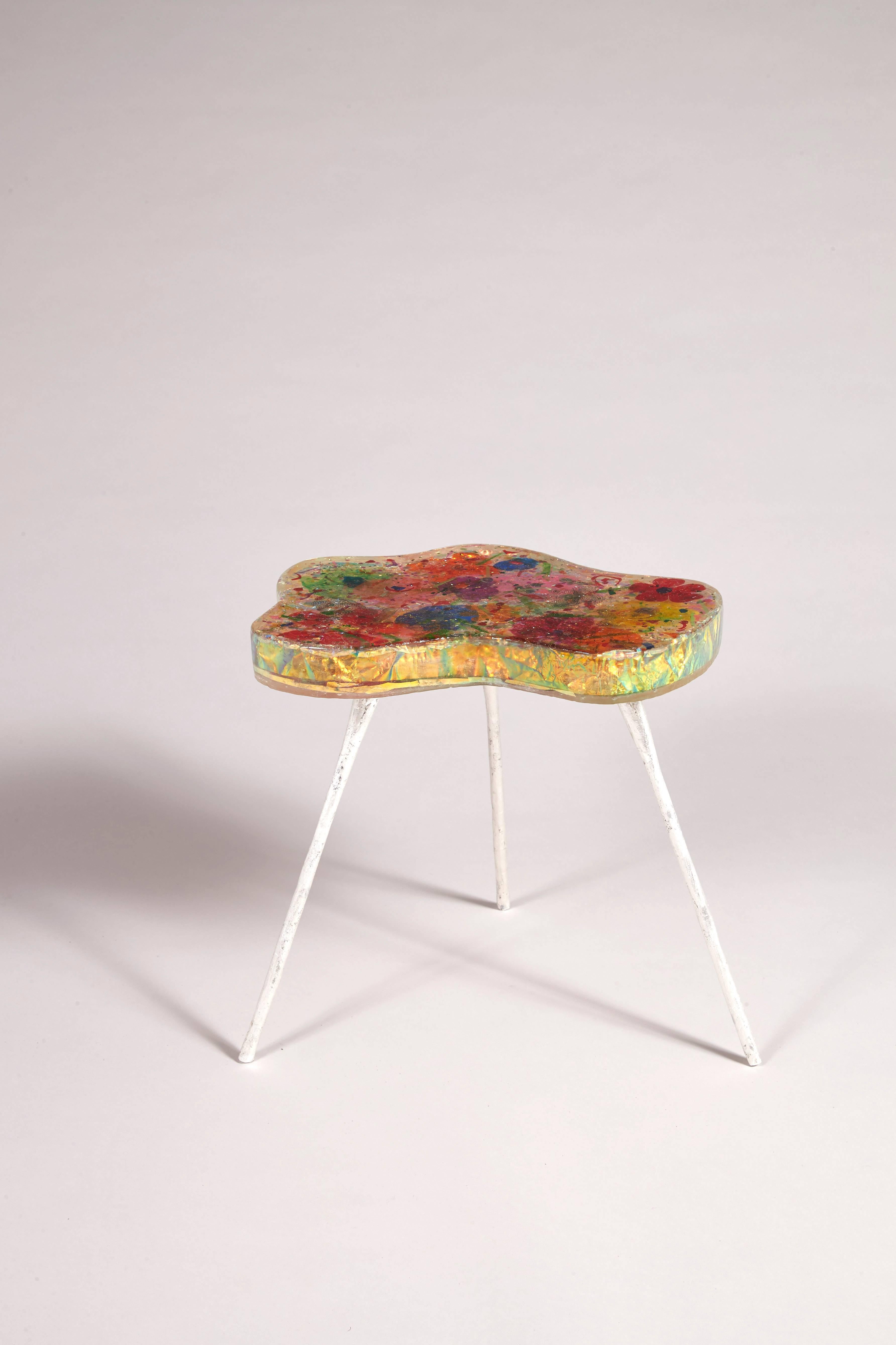 Side table,

2017.

Unique piece

Resin, inclusions, aluminum leaf.

Dia 17 1/8 x H 13 5/8 in.

For the past fifteen years, Hélène has been creating an extensive range of compelling works in her home-studio-laboratory on the outskirts of Paris. They