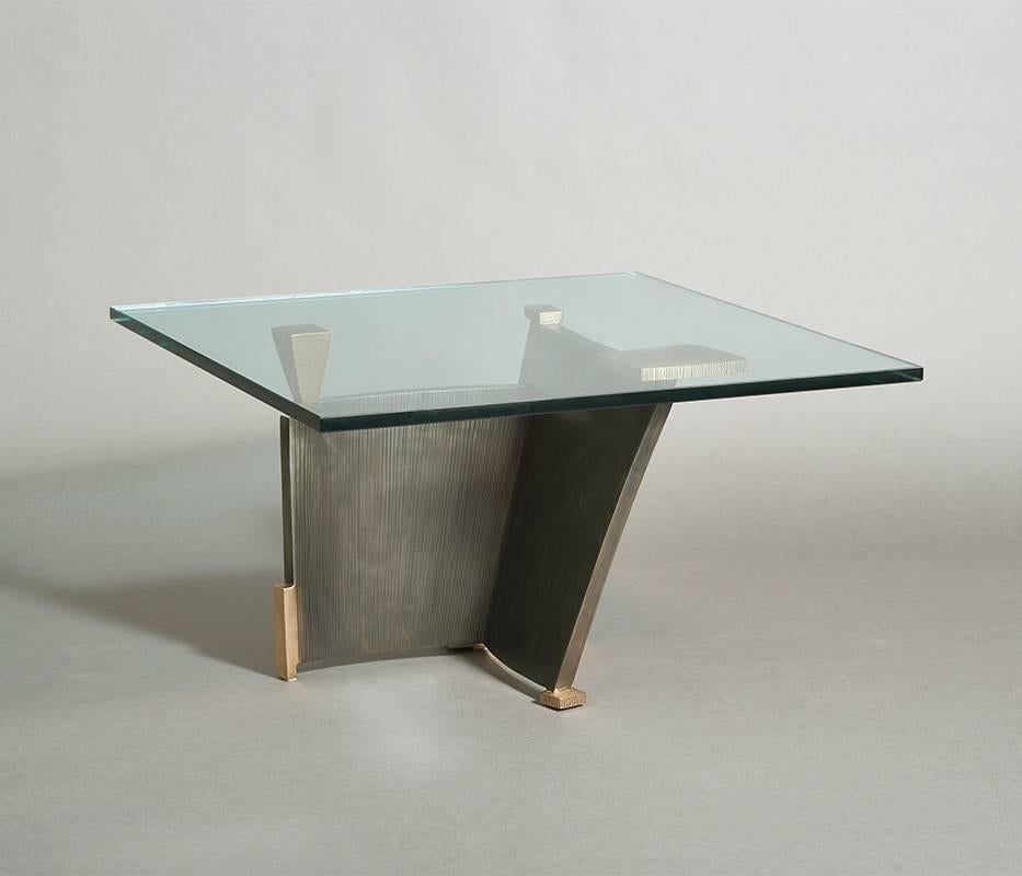 Gary Magakis’ blackened steel and textured/patinated bronze low table epitomizes the sculptor’s distinct approach to creating bold and dense geometric forms that simultaneously exude an elegant, buoyant aesthetic of Modernism. Following Magakis'