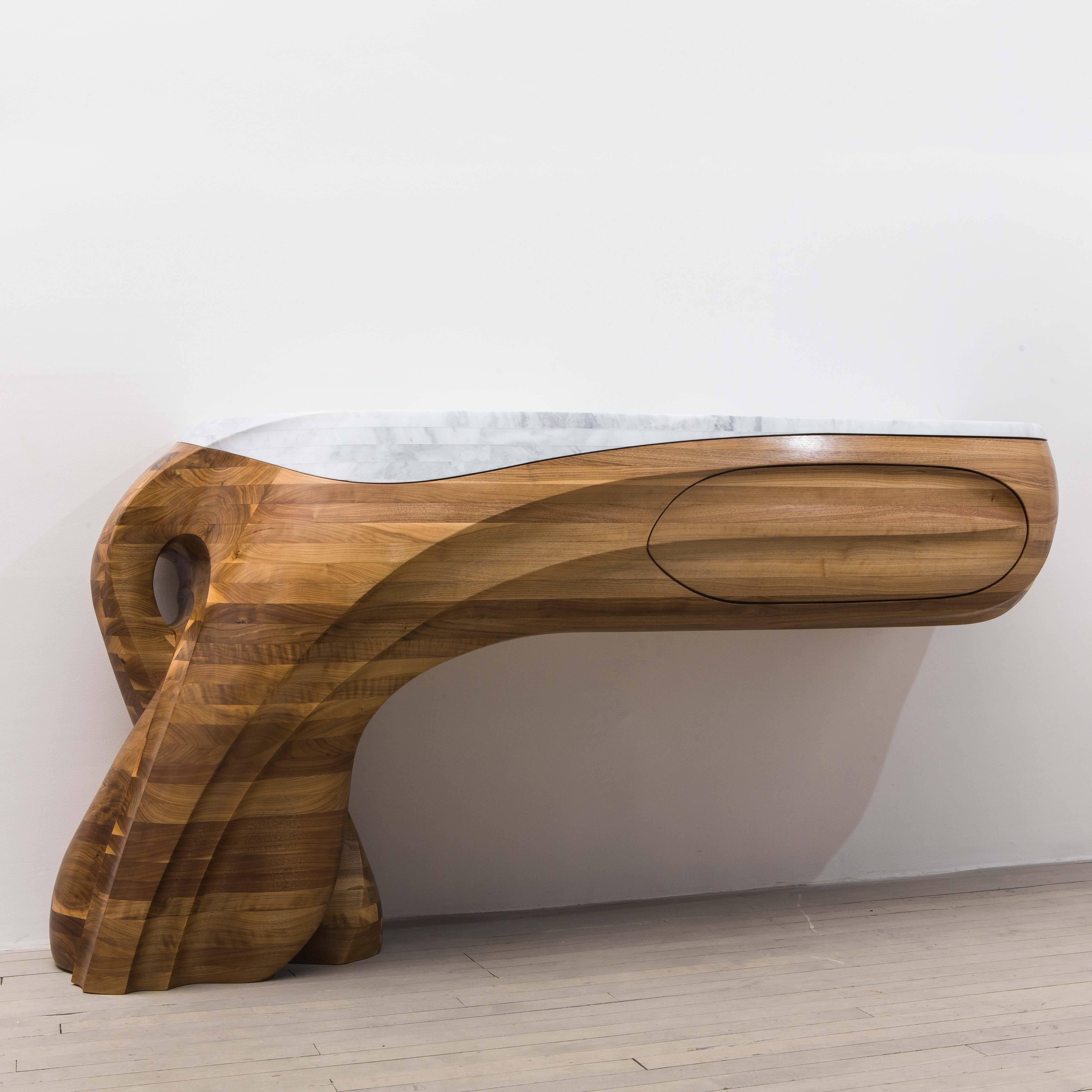 At once a sublime work of art and a functional object, BANG III is a unique, hand-carved console that defies easy categorization. Markus Haase’s two decades of experience as a sculptor are evident in his masterful treatment of materials, where