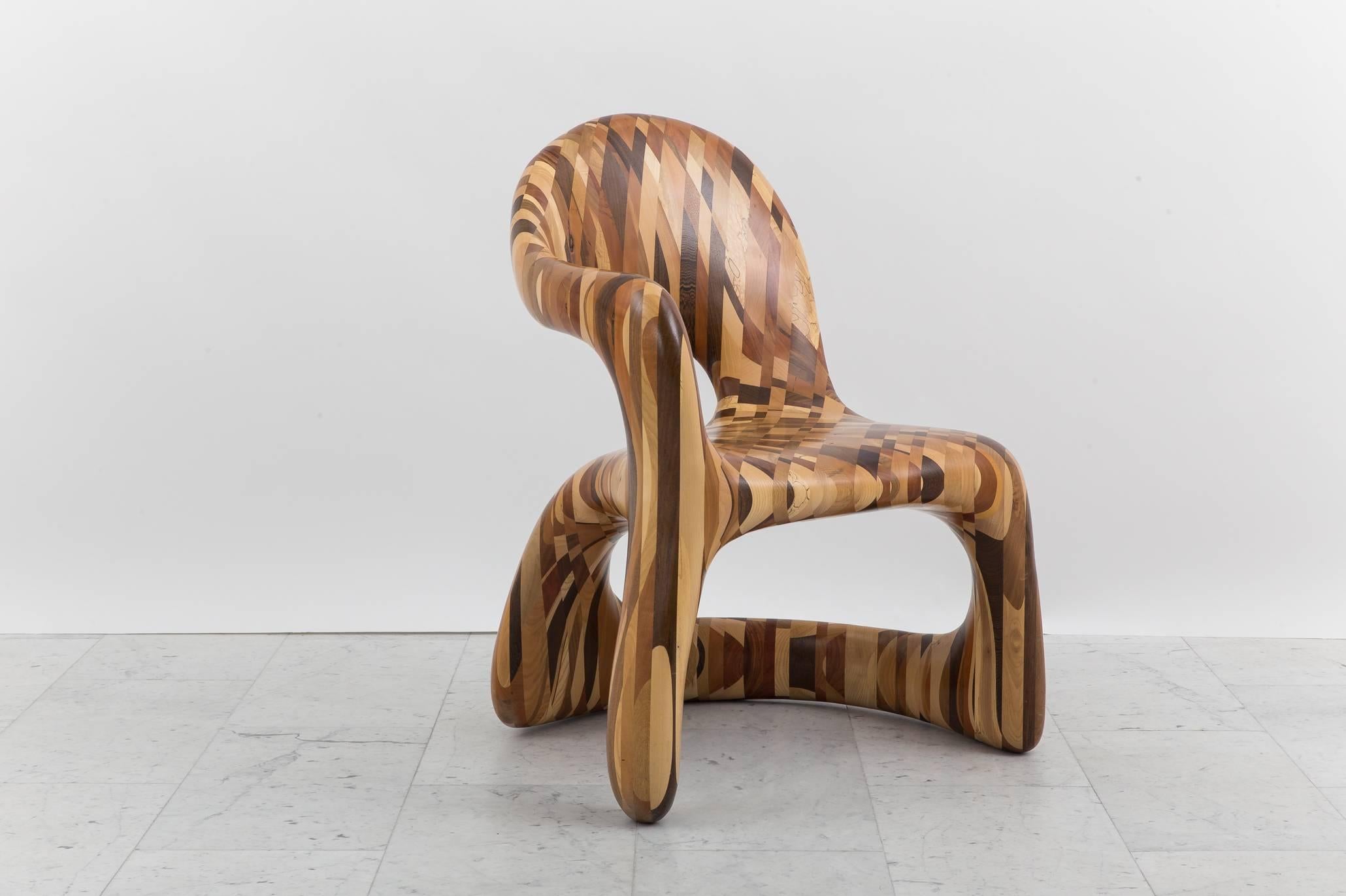 A hand-carved unique sculptural chair by Ian Spencer and Cairn Young of Yard Sale Project, the Corsican chair explores new possibilities and combinations in wood.

Challenging the traditional view of what a chair is, this unique work is both