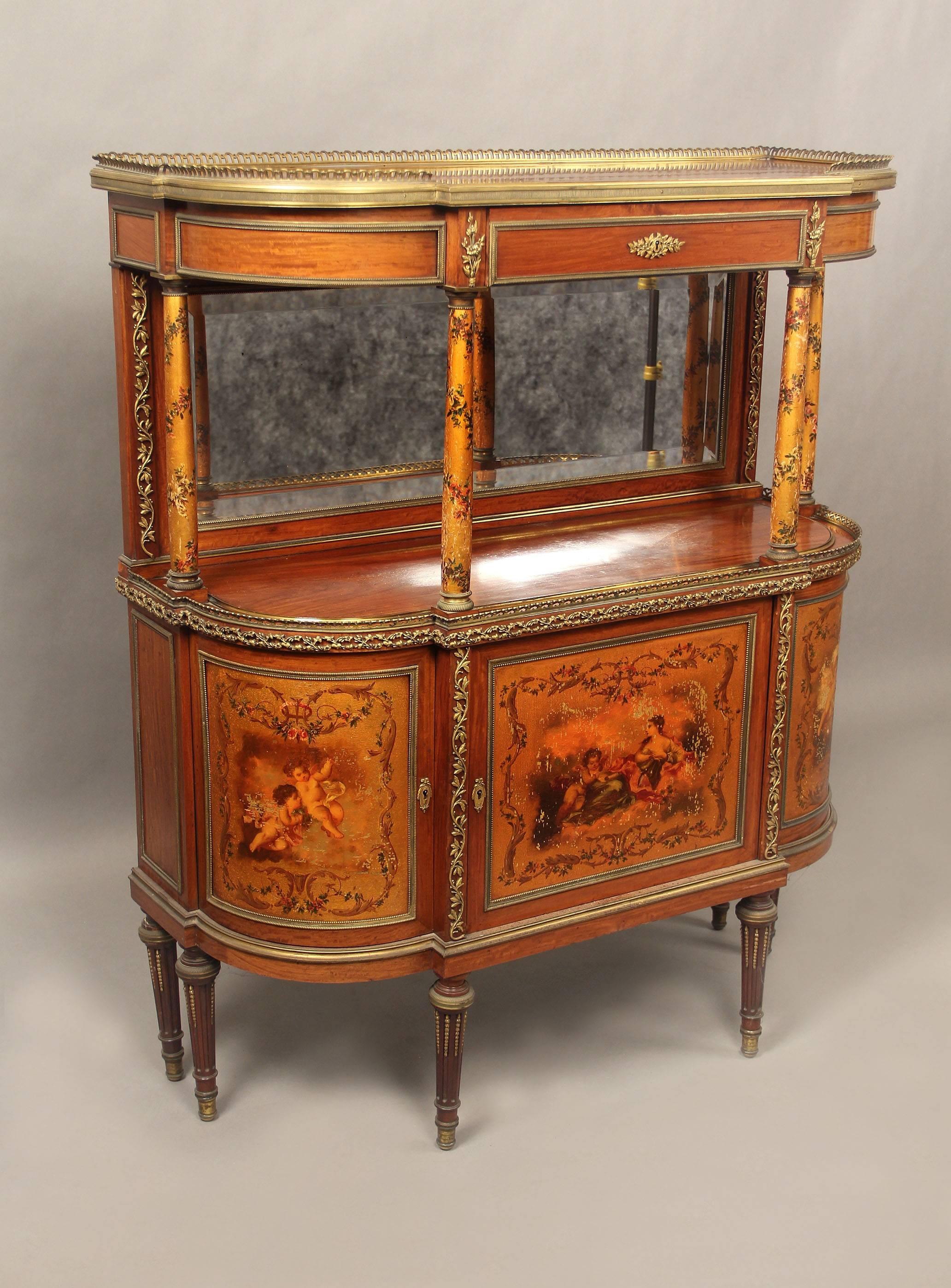 A lovely late 19th century gilt bronze-mounted English cabinet / server

By Hampton & Sons

A bronze gallery above a single drawer and four gilt and painted columns, with a mirrored back over three gilt and figural-painted doors with shelved