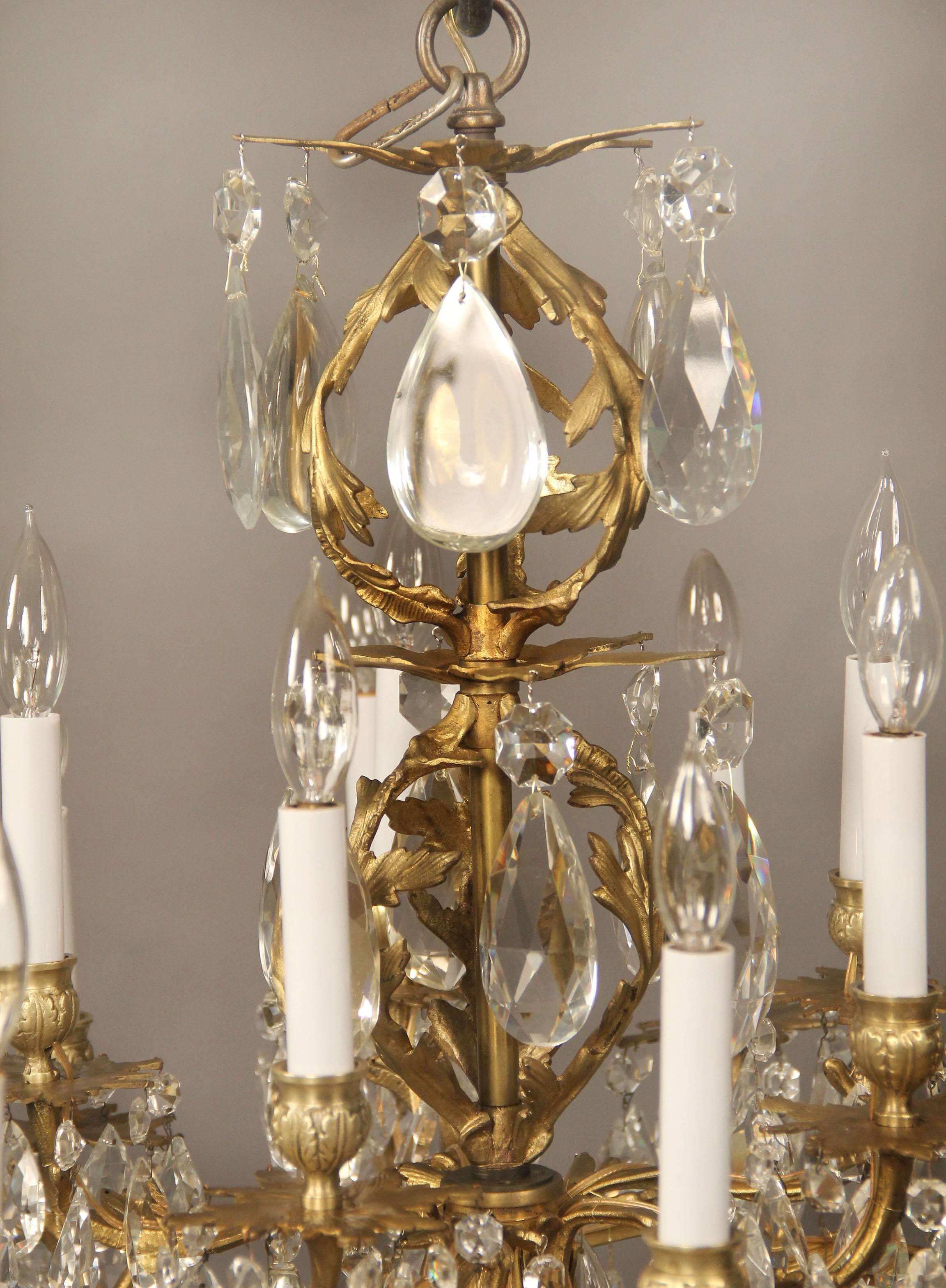 A nice late 19th century gilt bronze and cut crystal fifteen-light chandelier.

Multifaceted and shaped crystal, fifteen tiered perimeter lights.

If you are looking for a chandelier, a lantern or sets of sconces, Charles Cheriff Galleries is